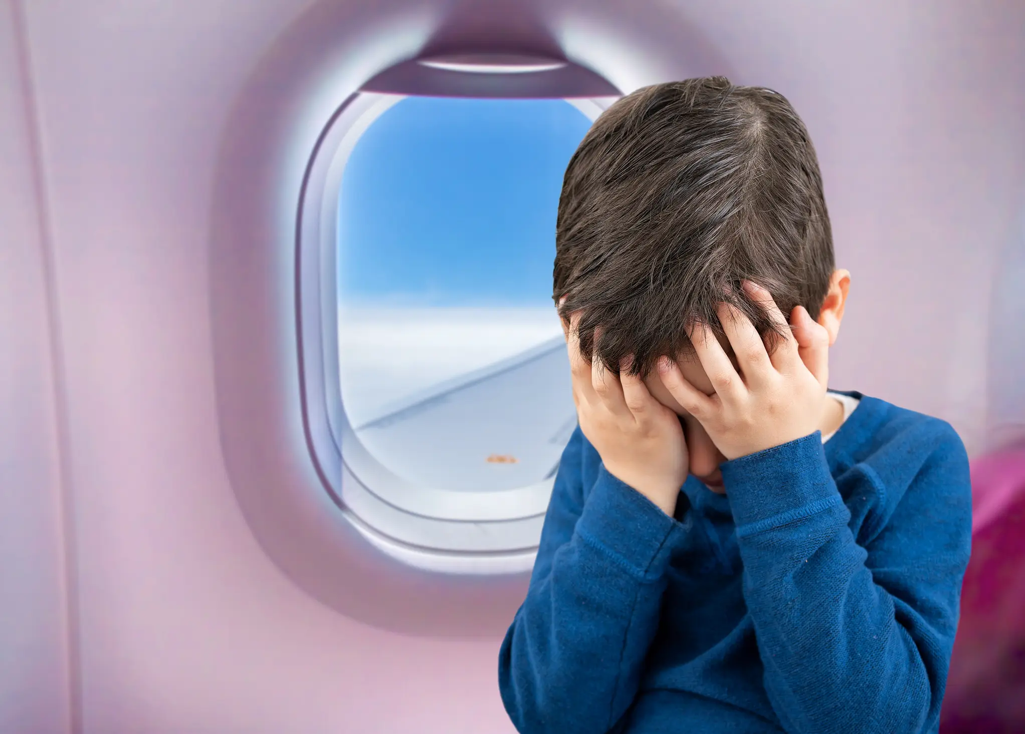 The poor kid must have been so scared travelling without his mom. (Getty Stock Image)