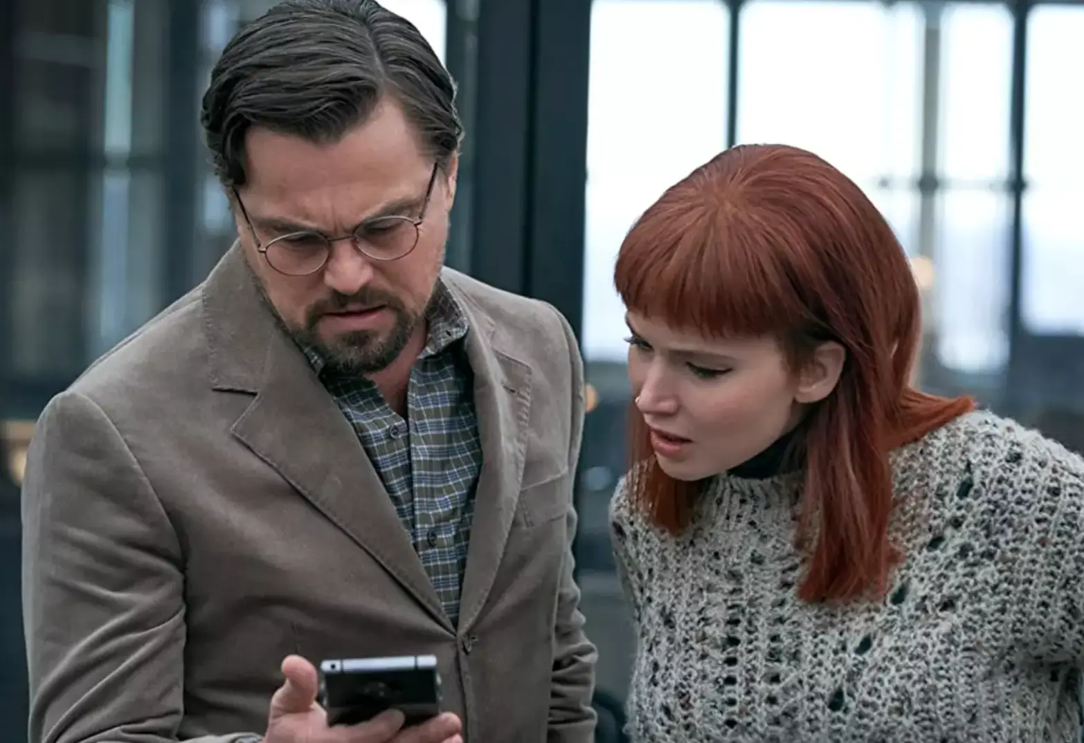 Lawrence and DiCaprio play the role of an astronomers.