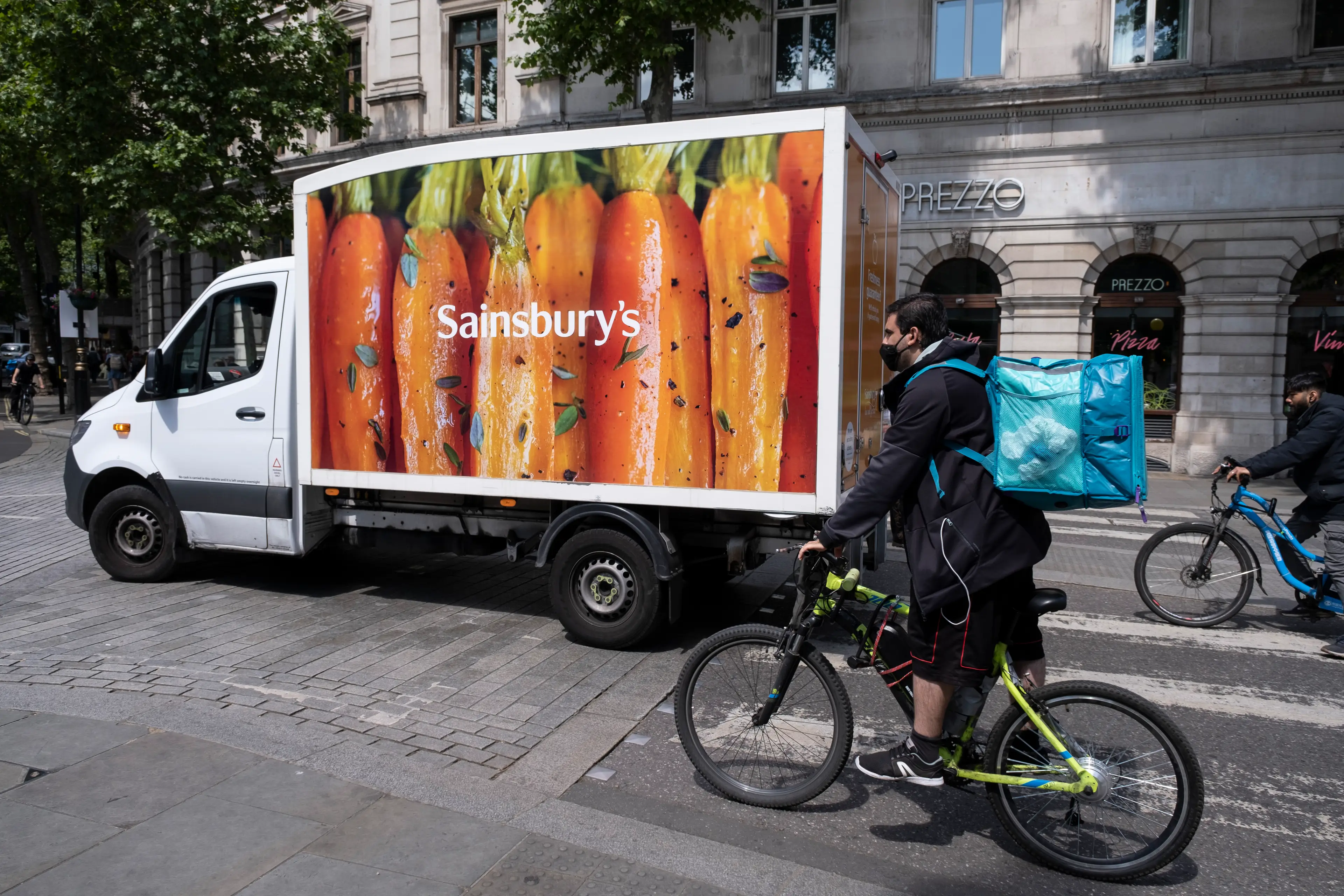 The delivery person picked up an order from Sainsbury's.