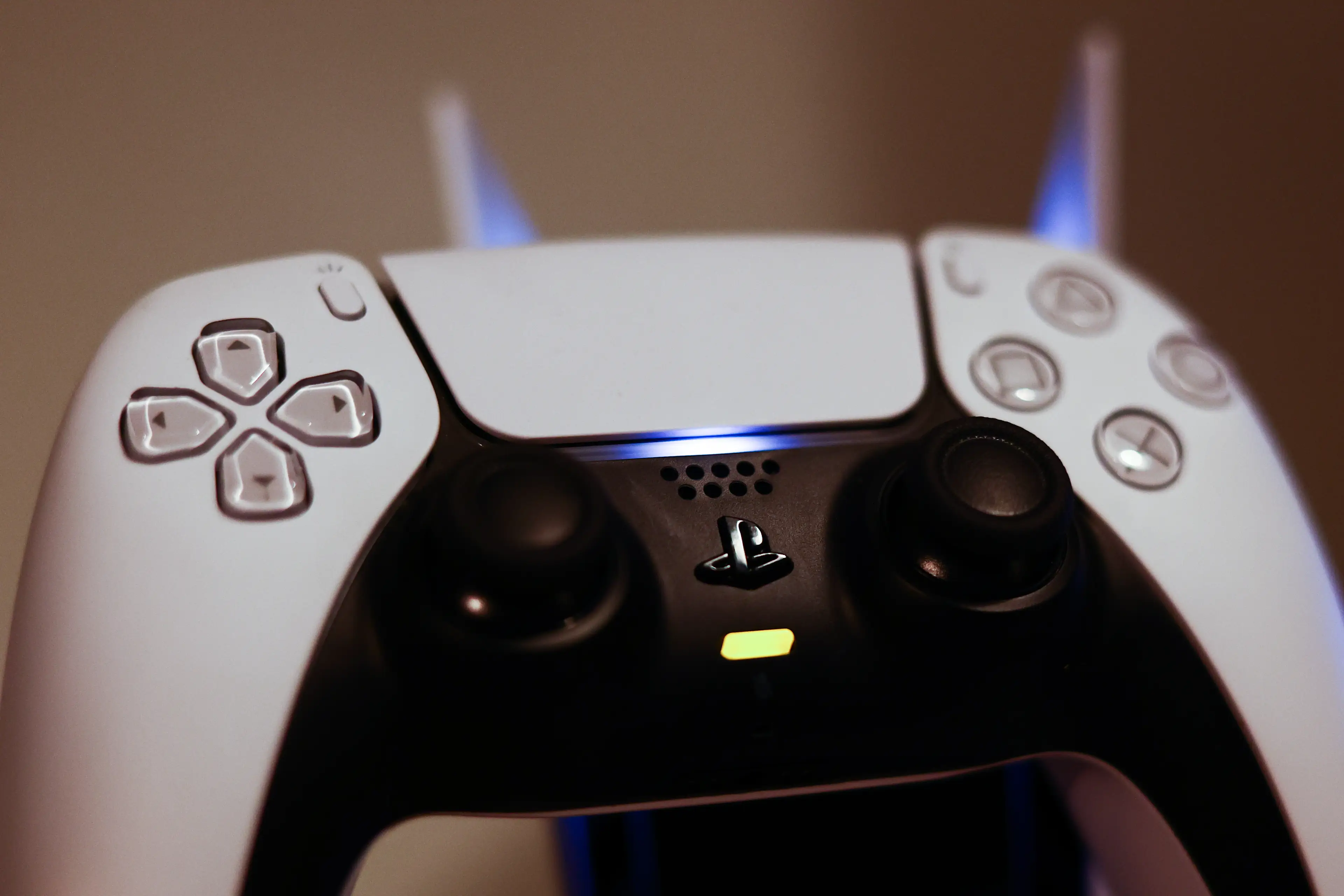 Have you ever looked closely at the underside of the PS5 controller? (Jakub Porzycki/NurPhoto via Getty Images) 