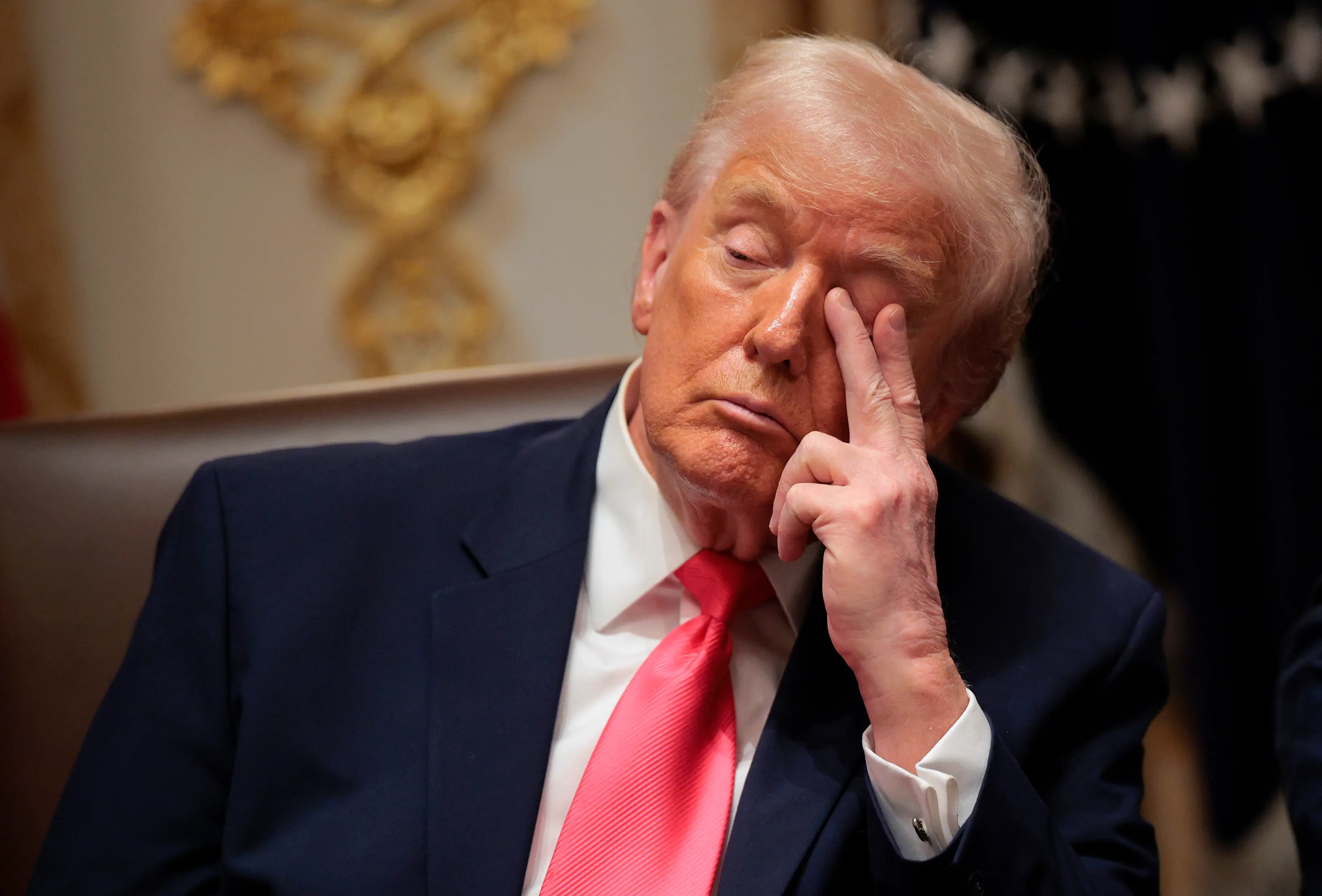 However as the meeting progressed, Trump appeared visibly tired and bored (Chip Somodevilla/Getty Images)