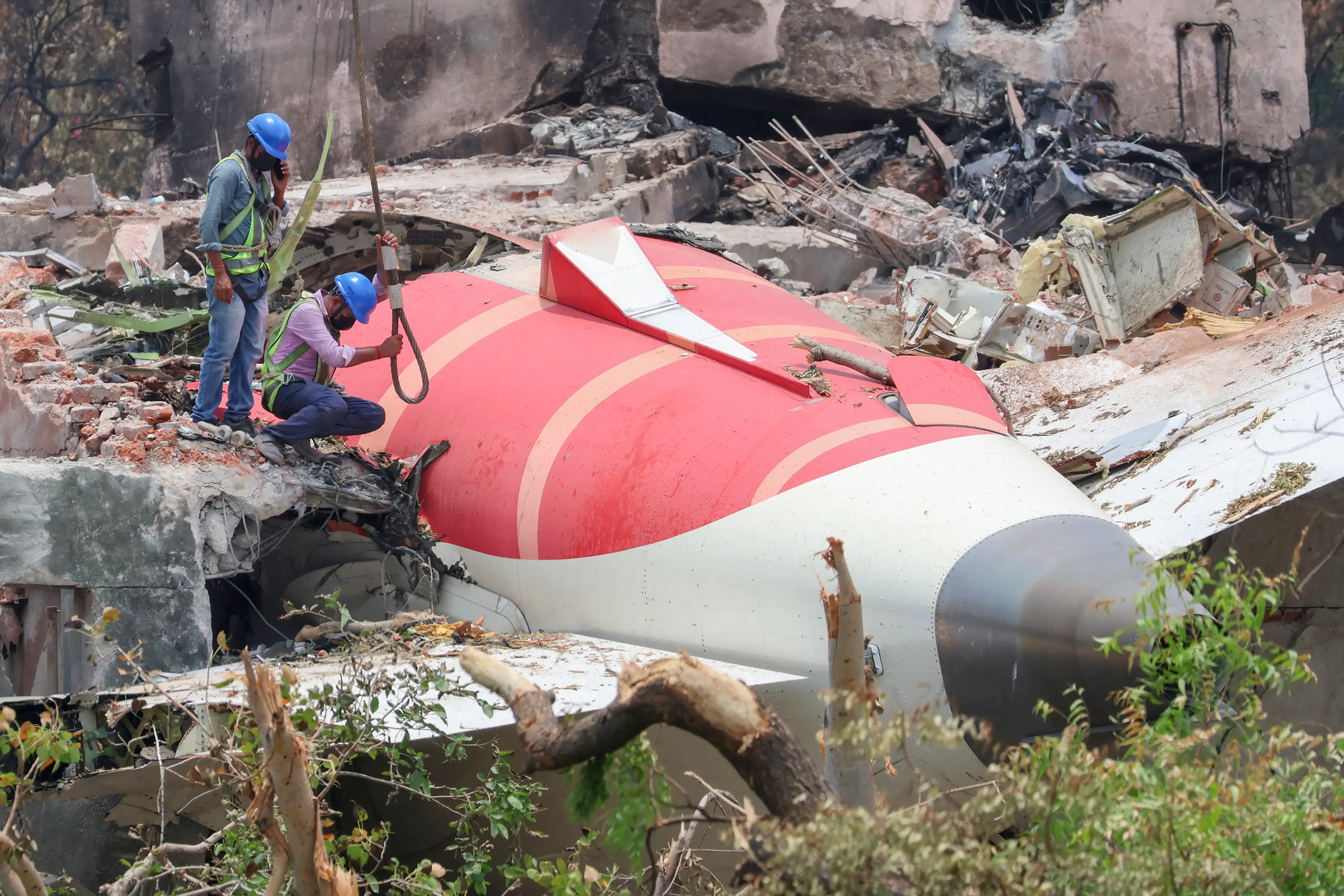 240 people died on the plane and 19 on the ground (BASIT ZARGAR/Middle east images/AFP via Getty Images)