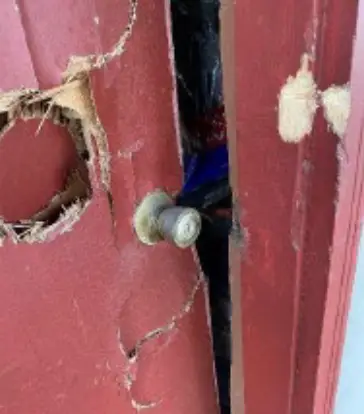 Damage police allegedly inflicted on Johnson's home.