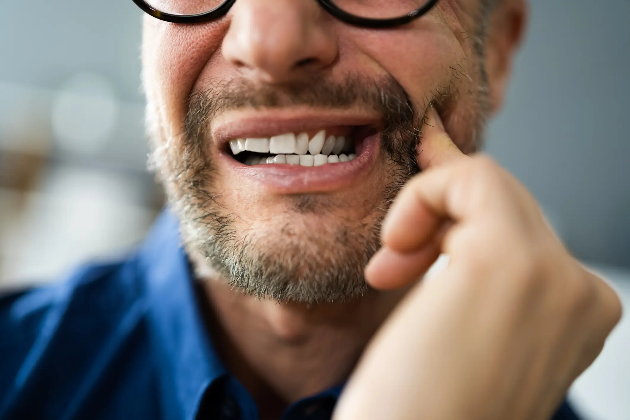 Symptoms can affect the teeth and mouth (AndreyPopov/Getty Images)