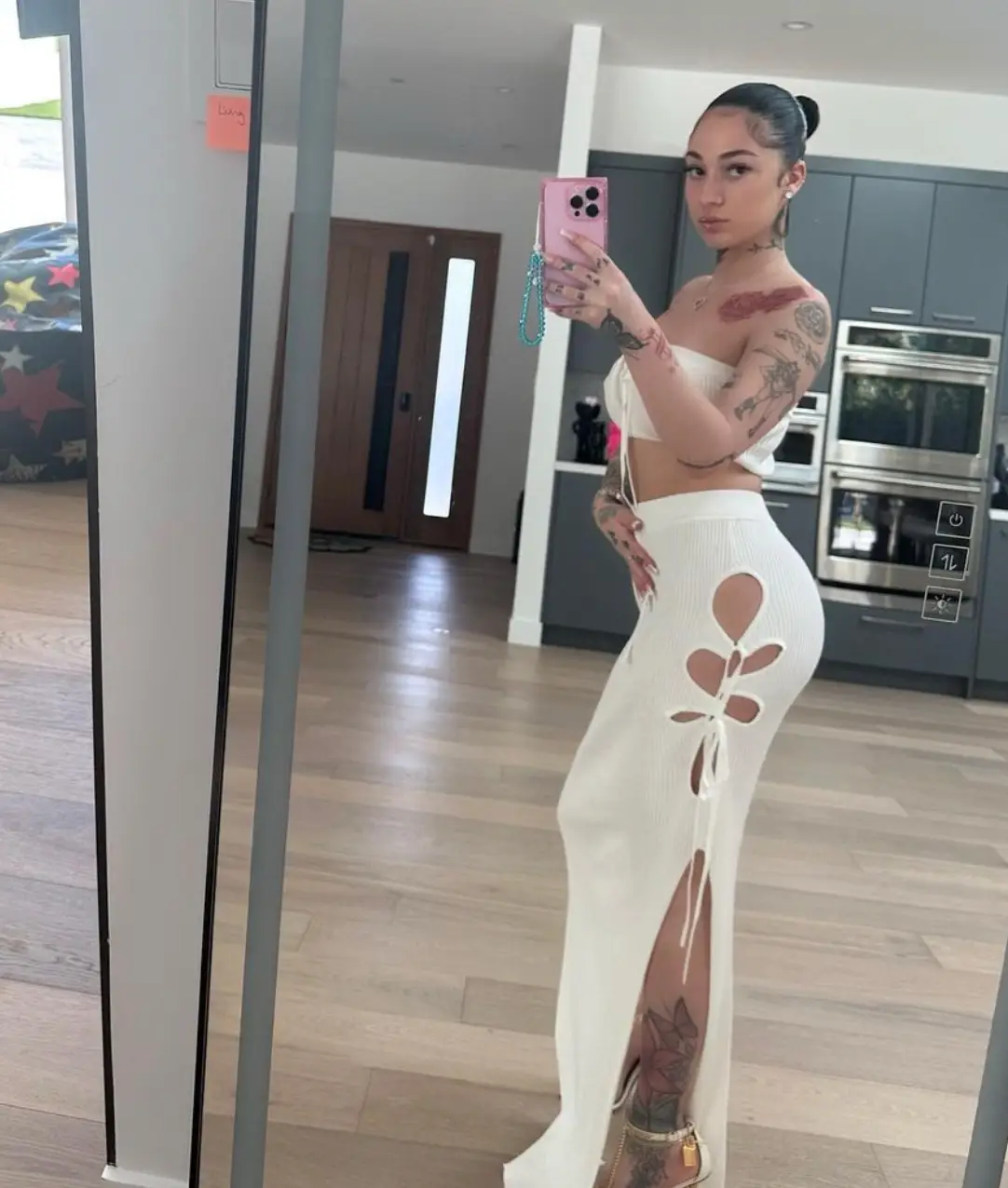 The rapper has admitted to having lip filler, veneers and silicone 'butt' injections.