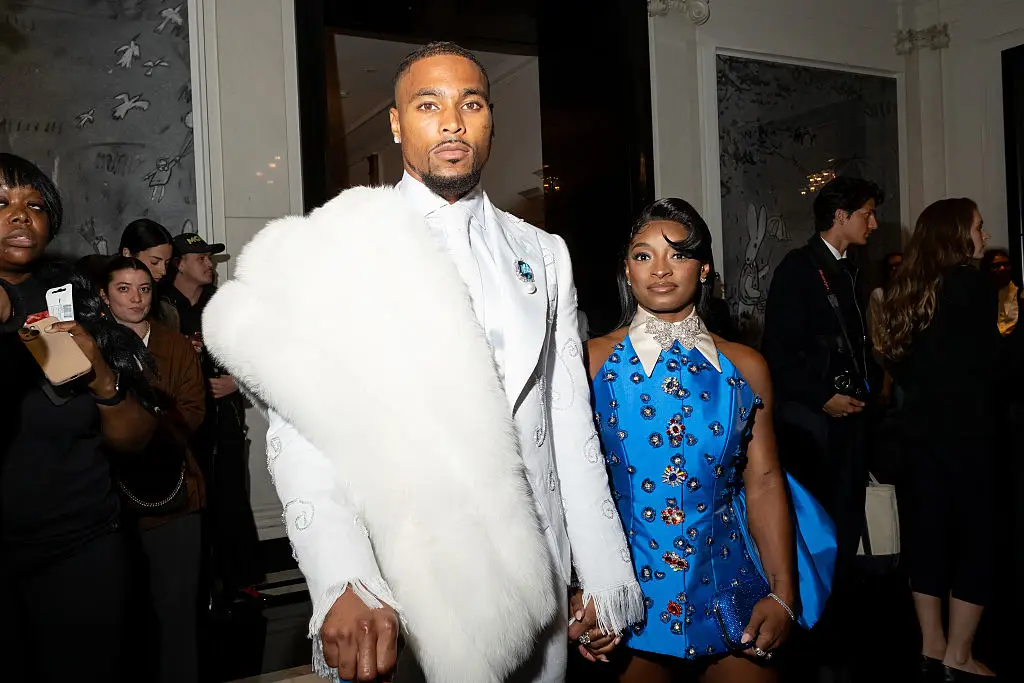 Biles with her husband, NFL star Jonathan Owens (Lanna Apiskuh/WWD via Getty Images)