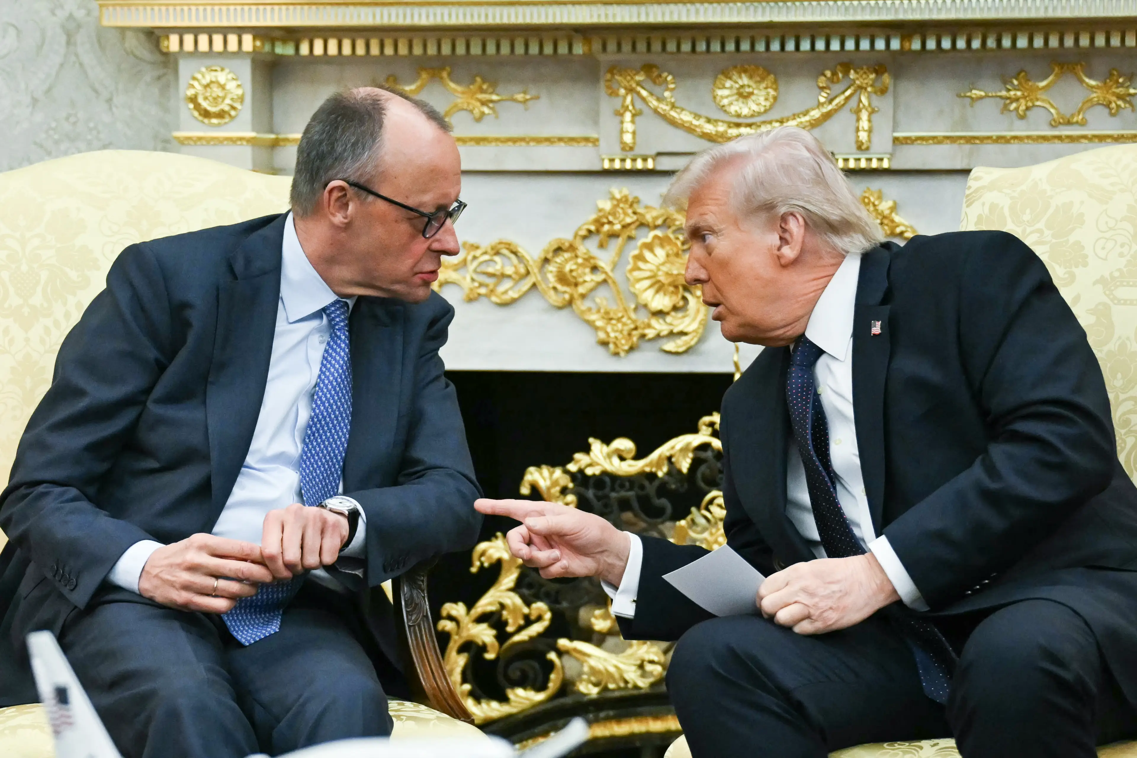 Donald Trump sat alongside German Chancellor Friedrich Merz (ANDREW CABALLERO-REYNOLDS/AFP via Getty Images)