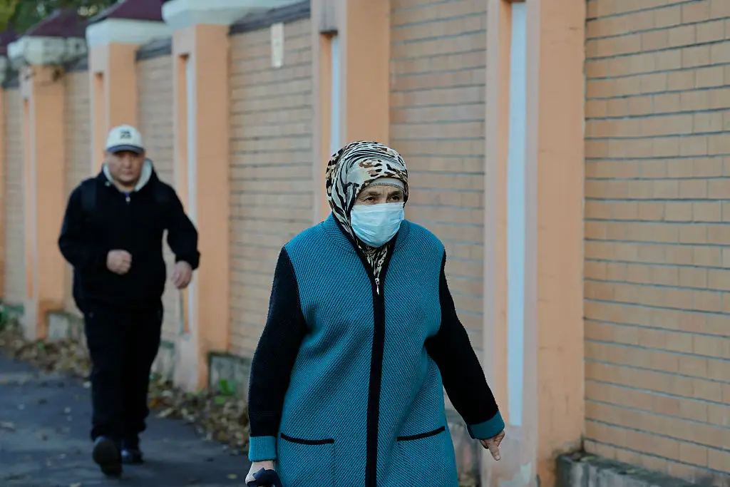 Locals were seen wearing protective masks in the Siberian city (Photo by TATYANA MAKEYEVA / AFP via Getty Images)