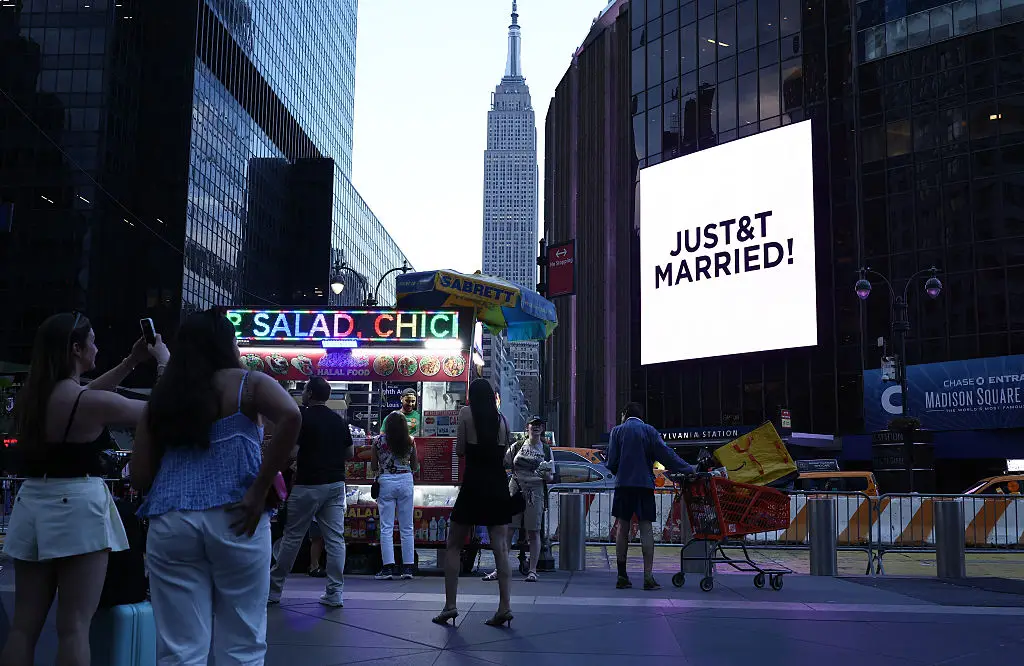 The couple announced they were married with a sign outside New York's iconic Madison Square Garden (Photo by CHARLY TRIBALLEAU / AFP via Getty Images)