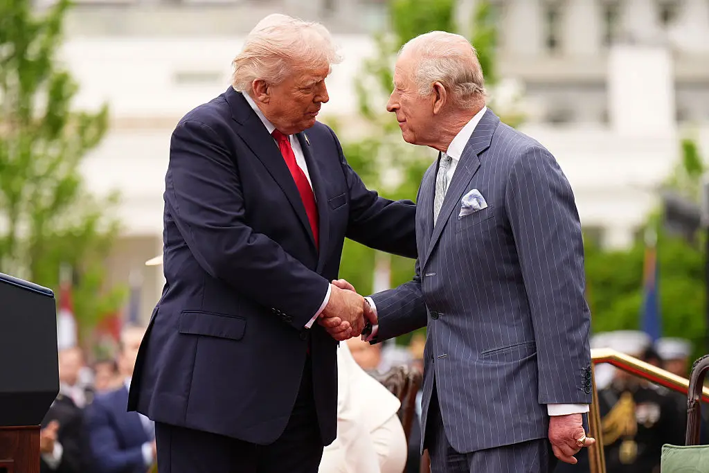 The hand bruising is ‘consistent with minor soft tissue irritation related to frequent handshaking in the setting of aspirin use for cardiovascular prevention’ the report states (Photo by Aaron Chown - Pool/Getty Images)
