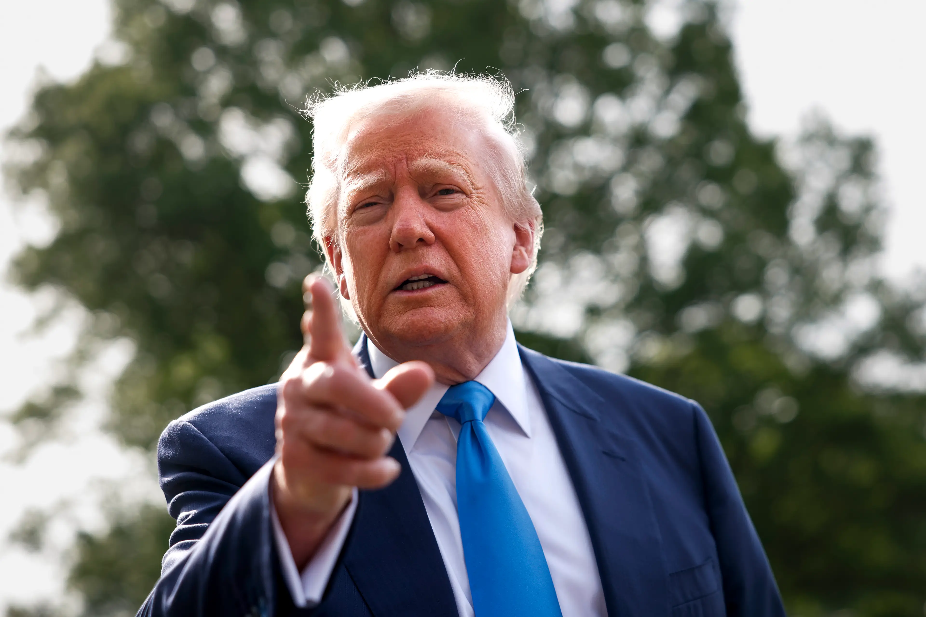 Donald Trump insisted China and US would find a way to work together regarding their ongoing tariff war (Kevin Dietsch/Getty Images)