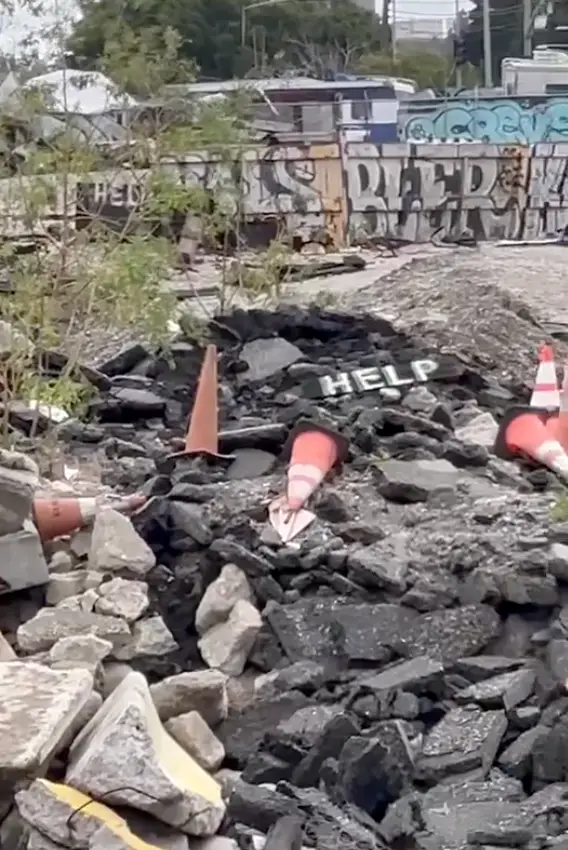 Mysterious 'help' signs have been spotted in Los Angeles (@LAguy310/Twitter)