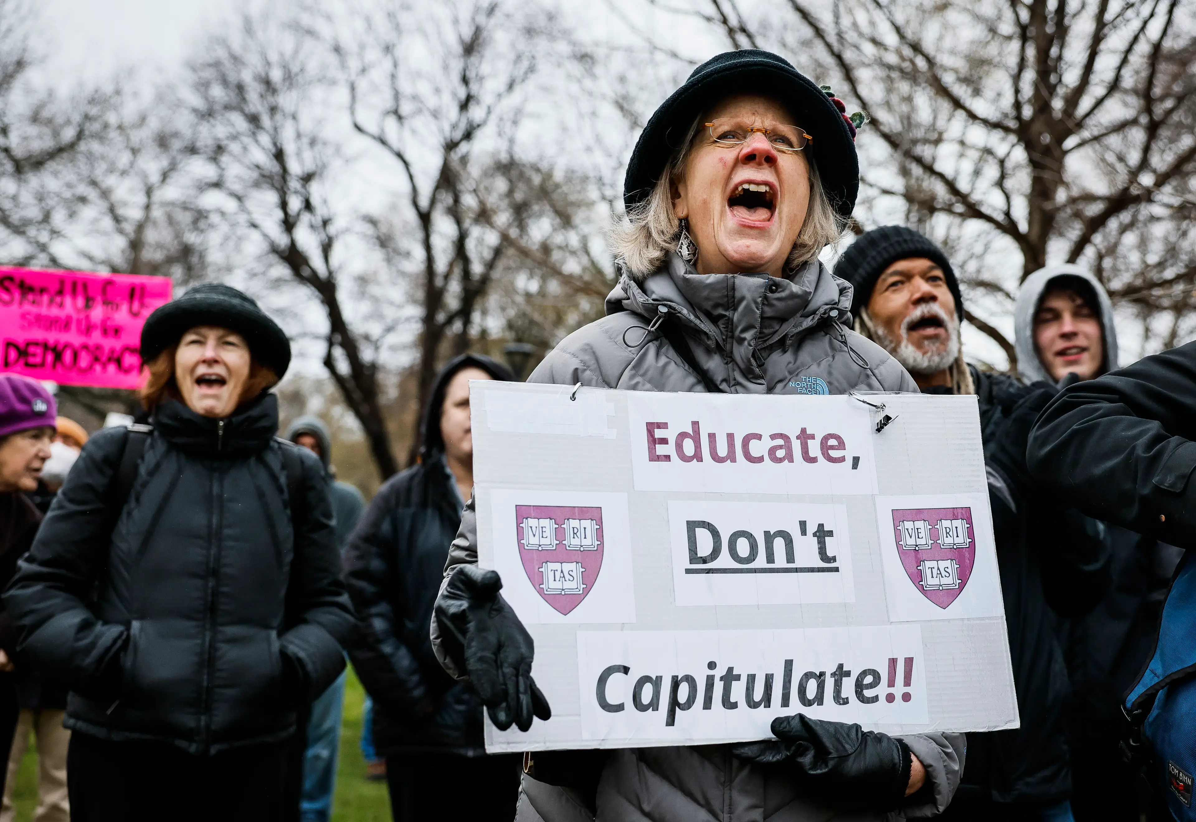 Protests took place against Trump's demands (Erin Clark/The Boston Globe via Getty Images)