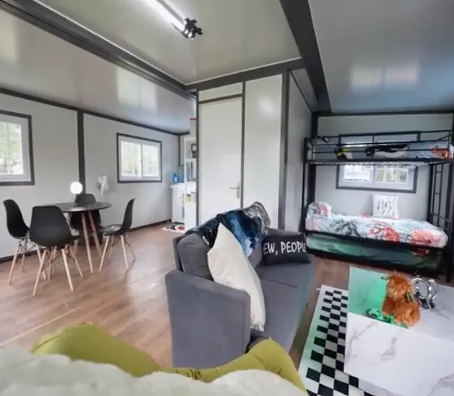 They've managed to squeeze a kitchen, dining area, lounge, bathroom and bedroom in.