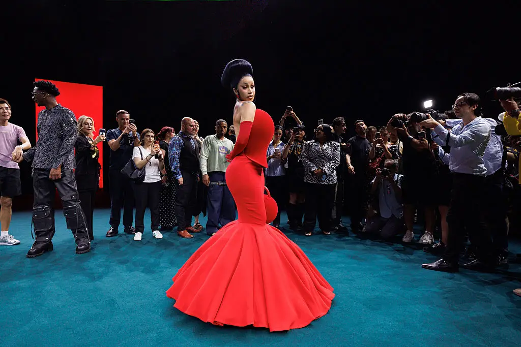 The rapper has previously opened up about getting filler in a 'basement apartment' (Photo by Justin Shin/WireImage)