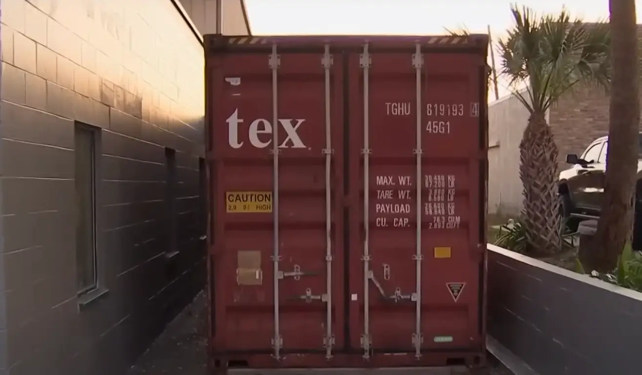 The mom was found in a shipping container.