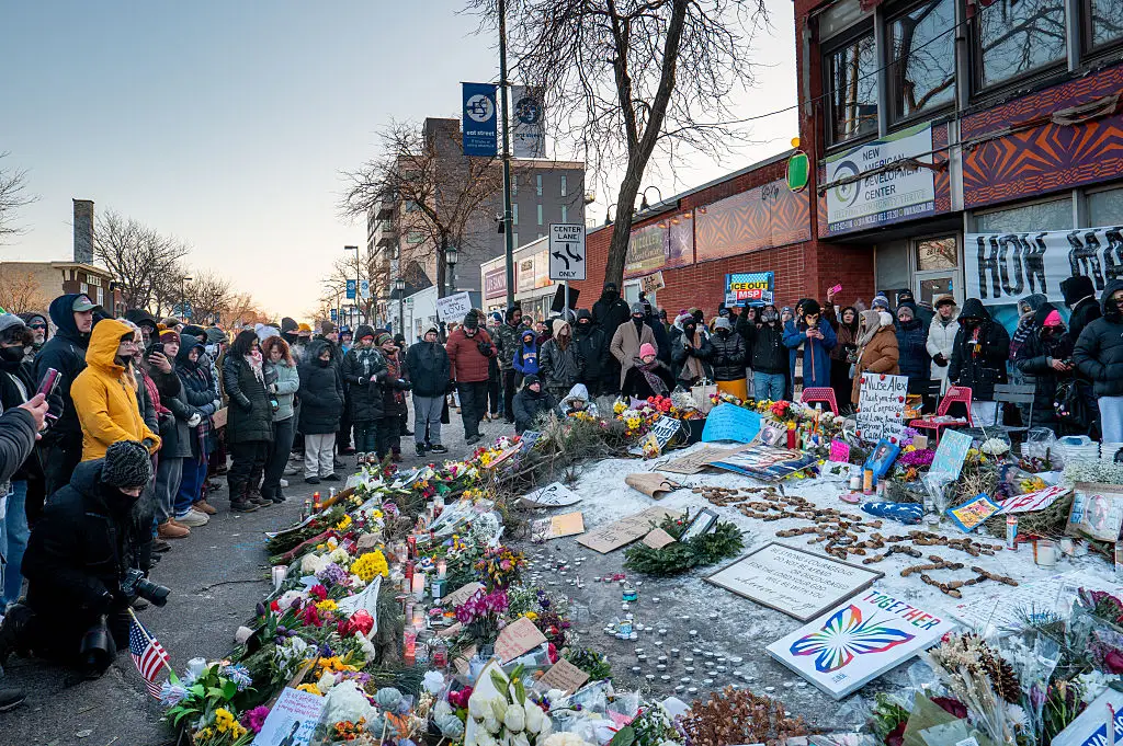 The scene of Alex Pretti's death has become a memorial to the late ICU nurse (Brandon Bell/Getty Images)