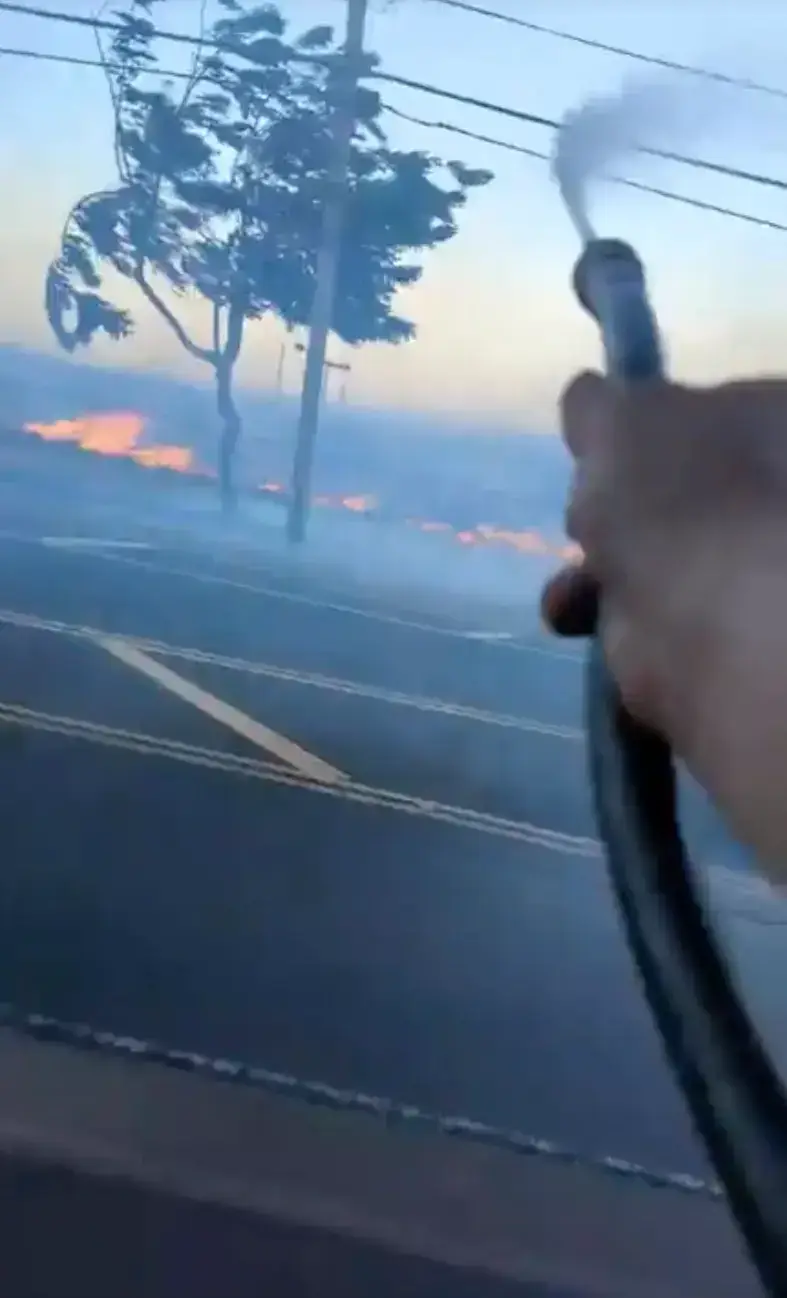 Footage taken by a local man on 8 August shows him fighting the fire and warning people of downed power lines.