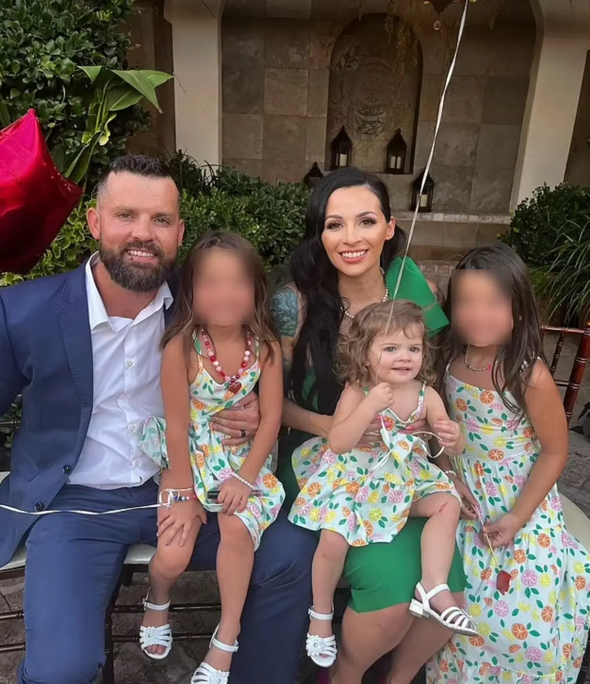 Erika and Christopher Scholtes pictured with Parker and their other two daughters. (Instagram)