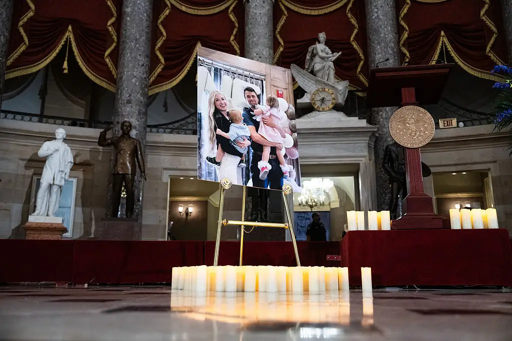 Erika and Charlie's children were front and centre at the memorial (Tom Williams/CQ-Roll Call, Inc via Getty Images)