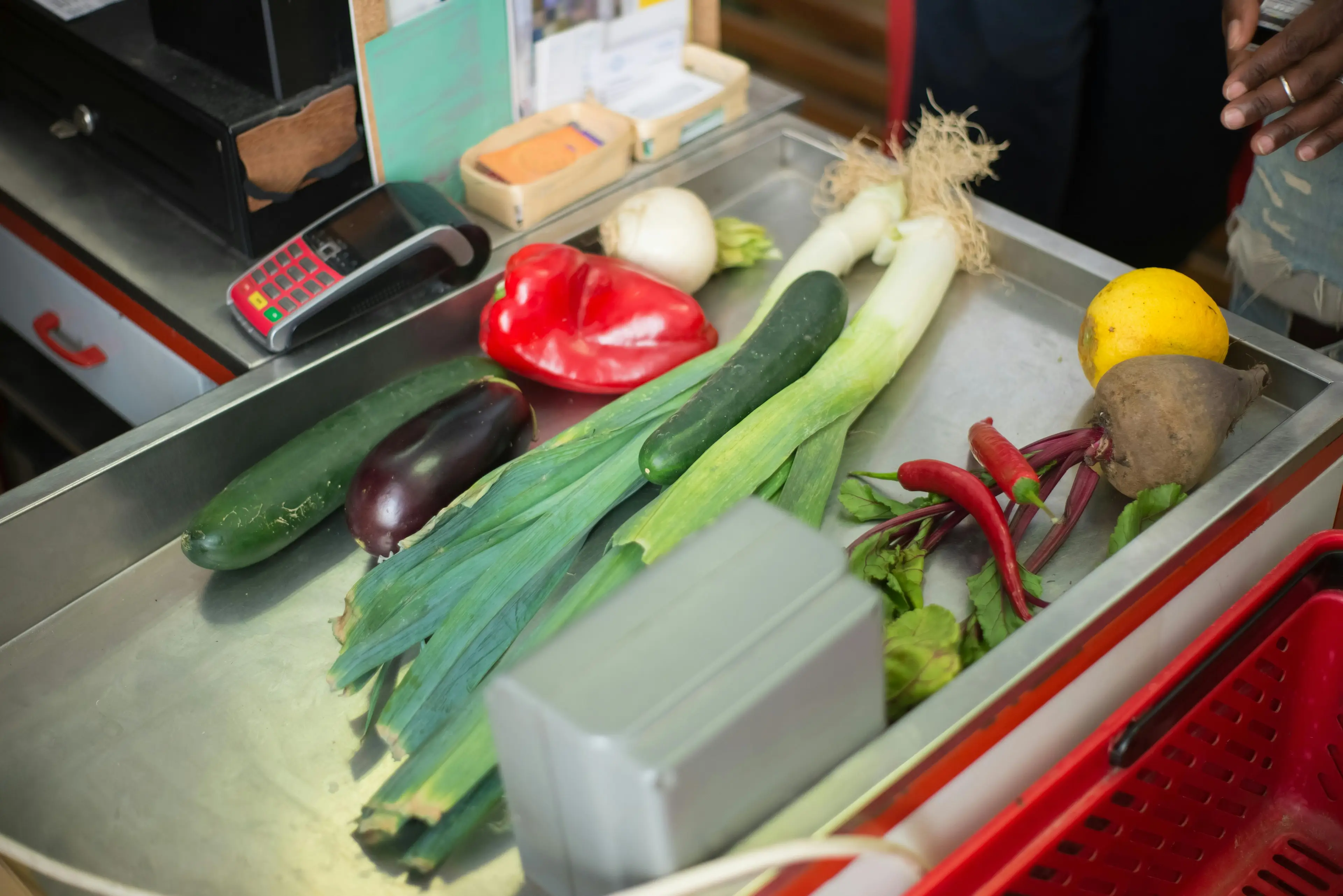 A woman has explained what happened when the person in front of her couldn't afford their grocery shopping.