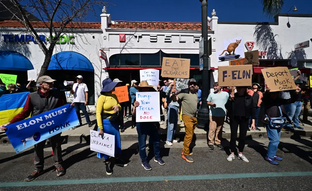 Several protests have taken place at Tesla dealerships, like this one in California last week (FREDERIC J. BROWN/AFP via Getty Images)