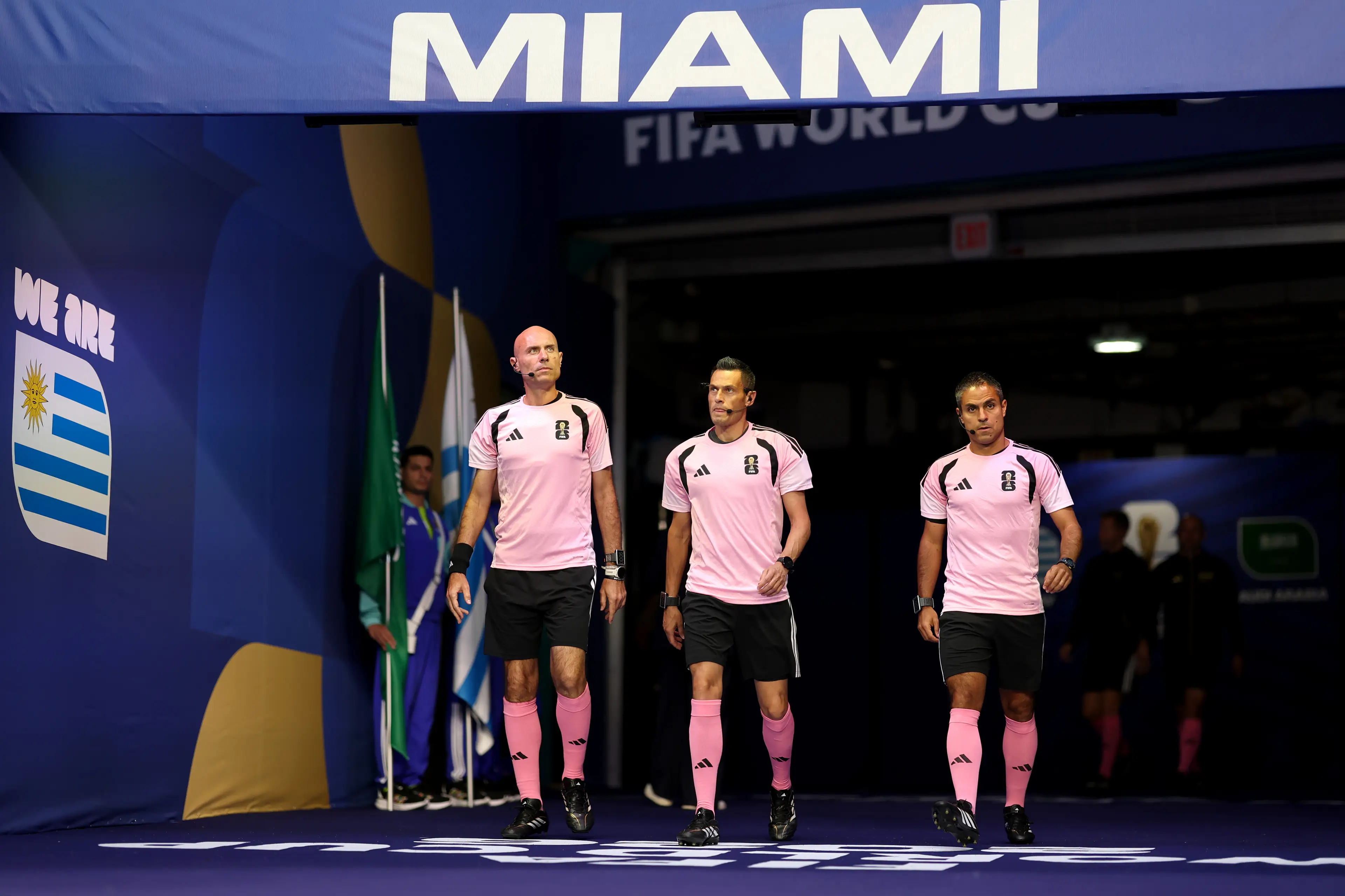 Referee Maurizio Mariani (C) walks out of the tunnel with match officials for warm ups before the FIFA World Cup 2026 Group H match between Saudi Arabia and Uruguay ( Julian Finney - FIFA/FIFA via Getty Images)