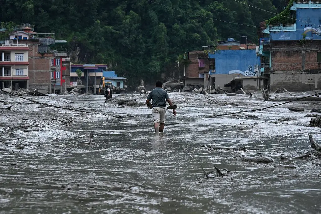 Ramesh and Neelam were on a pilgrimage to the sacred peak of Mount Kailash when the floods struck. (Photo by PRAKASH MATHEMA / AFP via Getty Images)