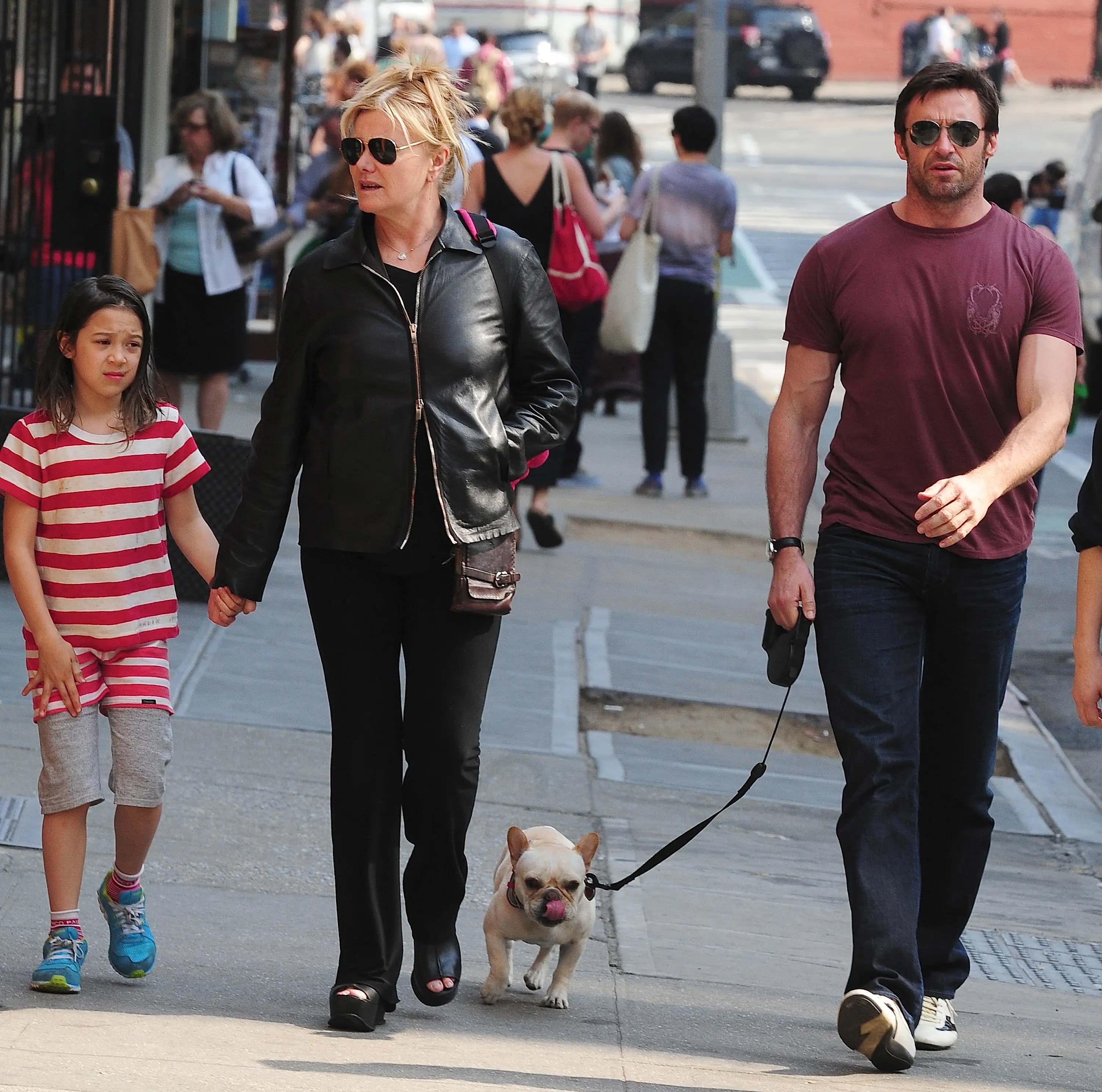 Hugh and Deborra pictured with their daughter in 2013.