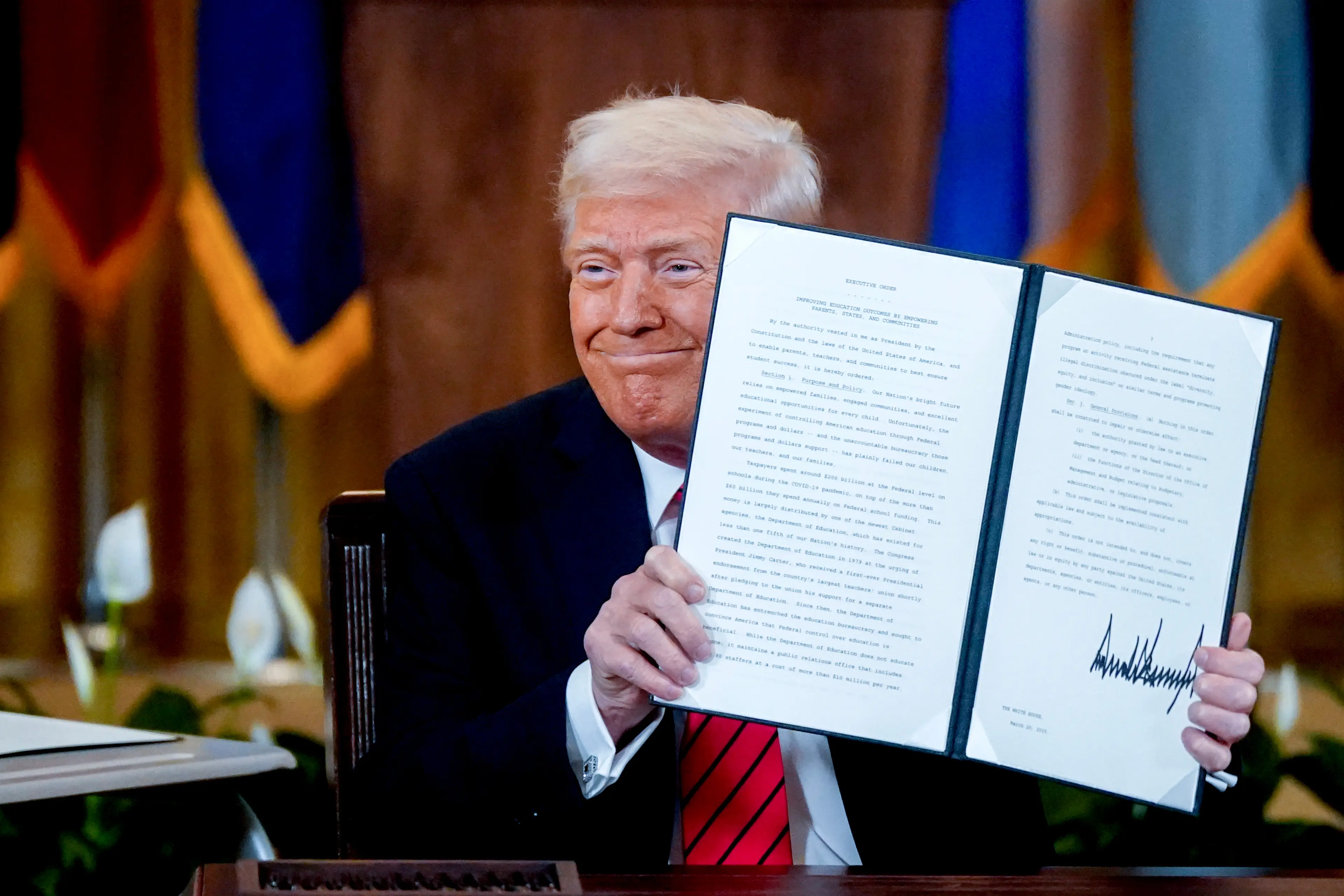 The 'trade war' began when Trump signed an executive order which accused China of facilitating illegal immigration and drugs into the US (Kent Nishimura/Bloomberg via Getty Images)