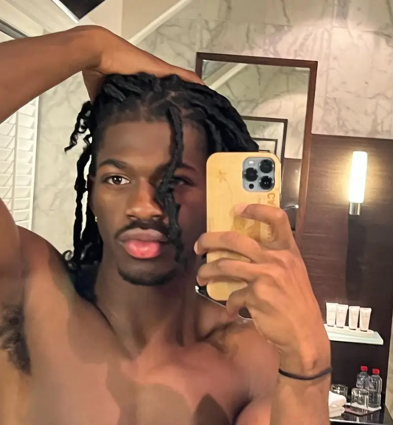 Nas was covered head-to-toe in silver paint for the event.