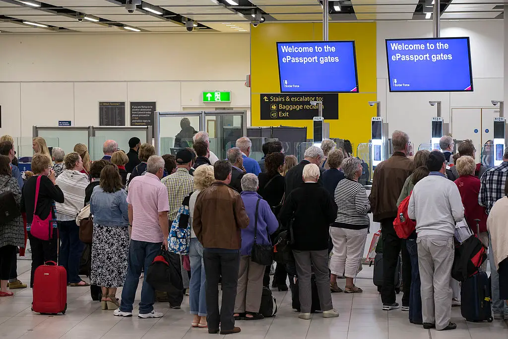 Long airport queues have already been reported (Stock photo - Oli Scarff/Getty Images)