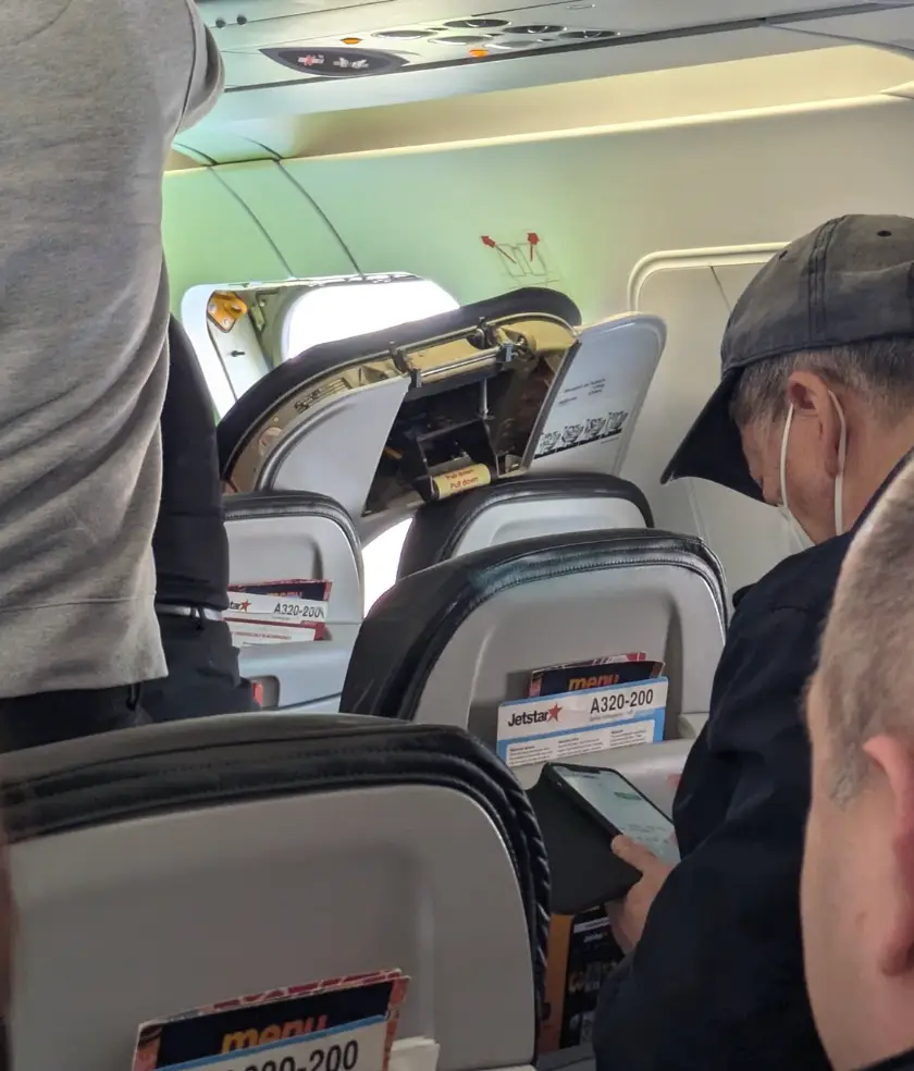 The door was 'ripped off' by a passenger. (@gewwyArt/Twitter)