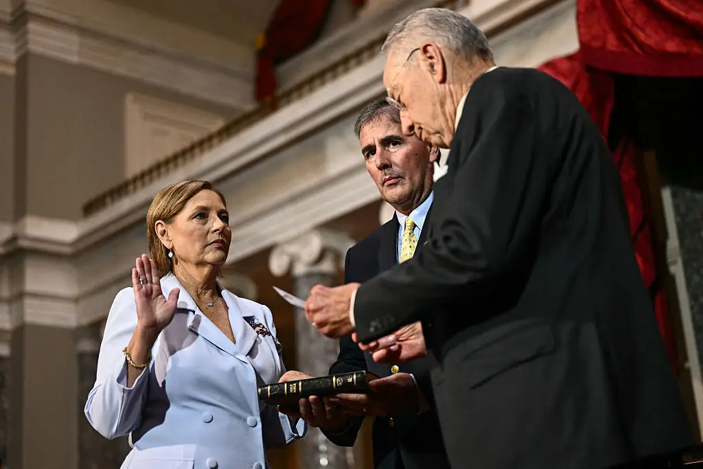 Darline was sworn in as Senator following her brother's death (Photo by Kent NISHIMURA / AFP via Getty Images)