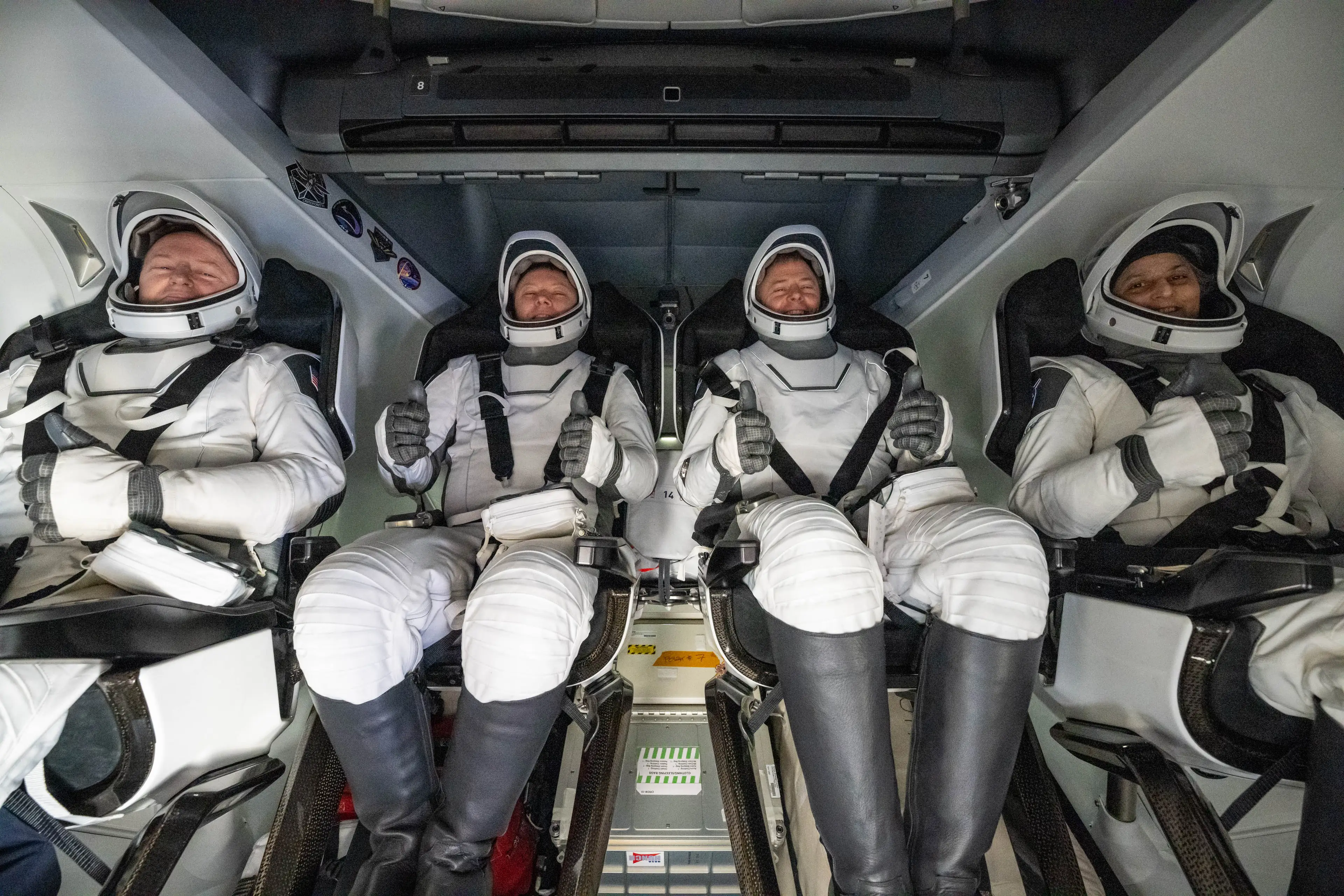 Suni and Butch braced themselves as they came back to planet Earth (Keegan Barber/NASA via Getty Images)