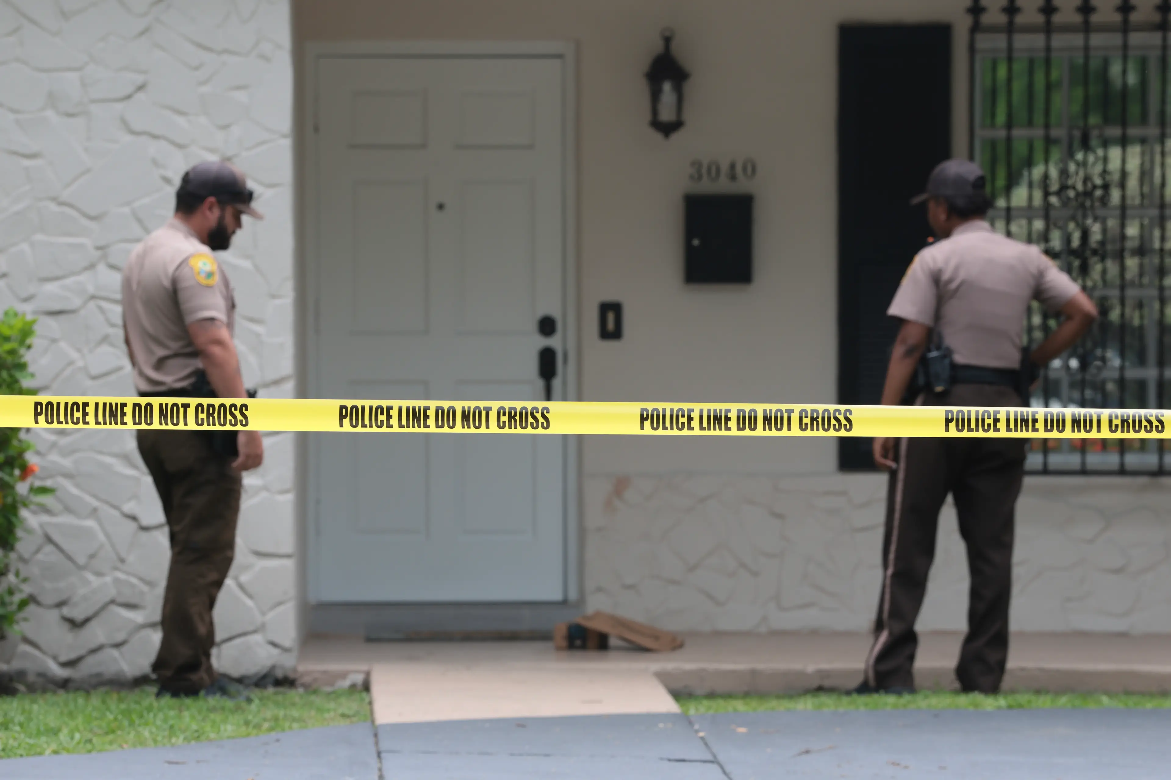 Miami-Dade County Sheriff’s deputies seen at the home where Perez Hilton was found (Joe Raedle/Getty Images)