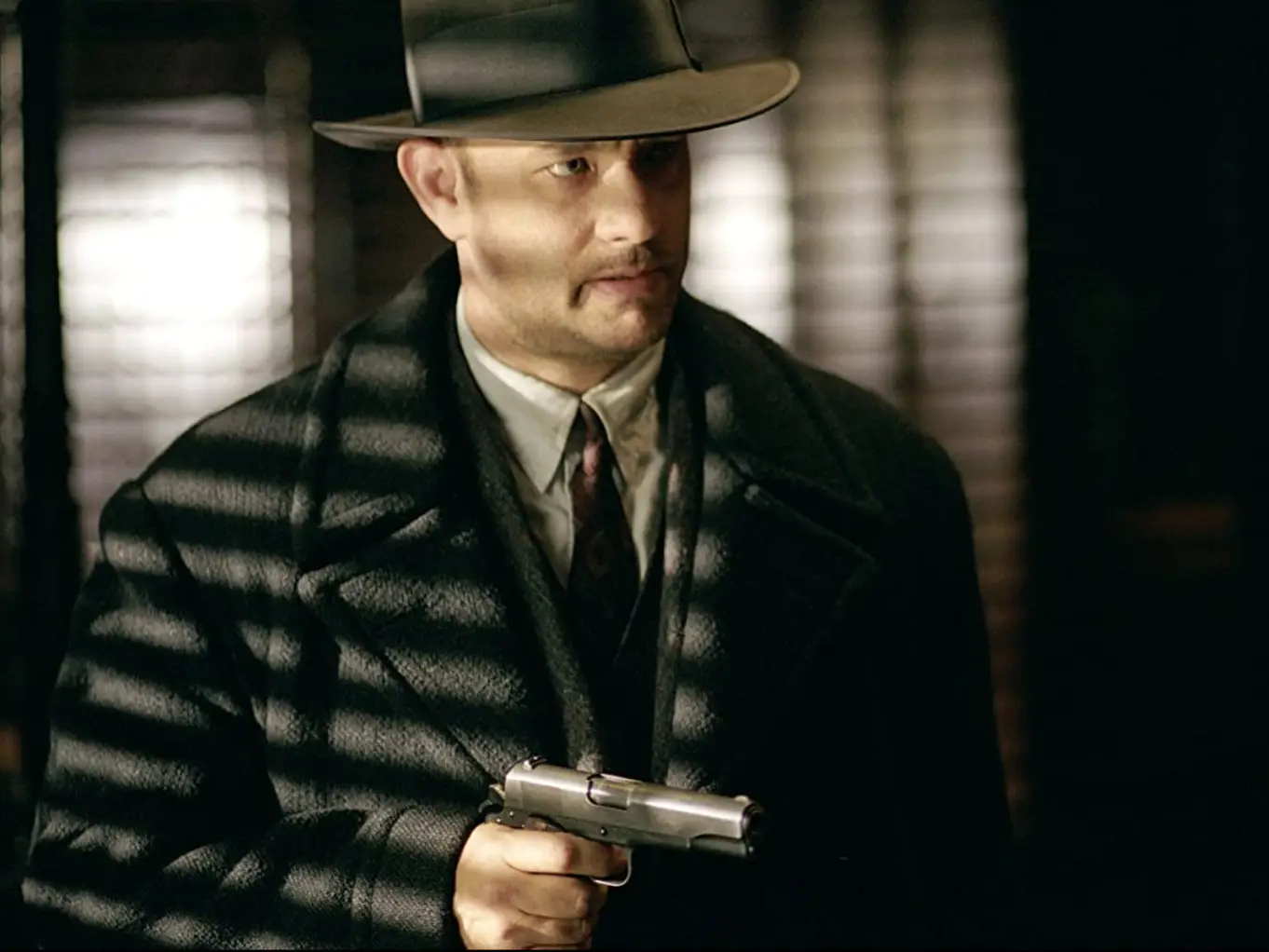 Tom Hanks played the role of a hitman.