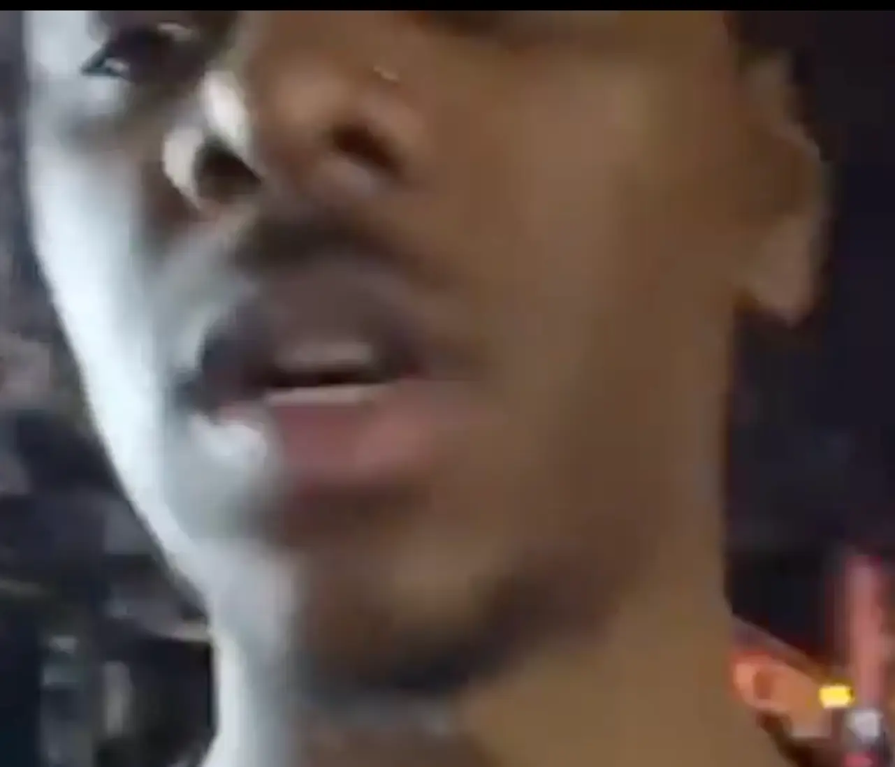 The streamer knocked something over while walking down the street.