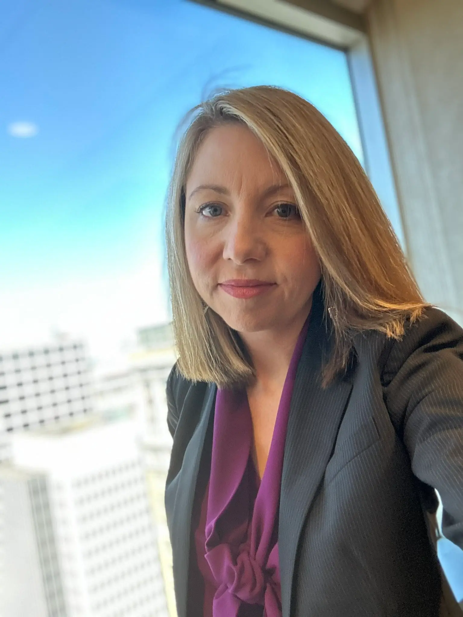 Aber here wearing purple in support of victims of domestic violence (@‌USAttyAber/Twitter) 