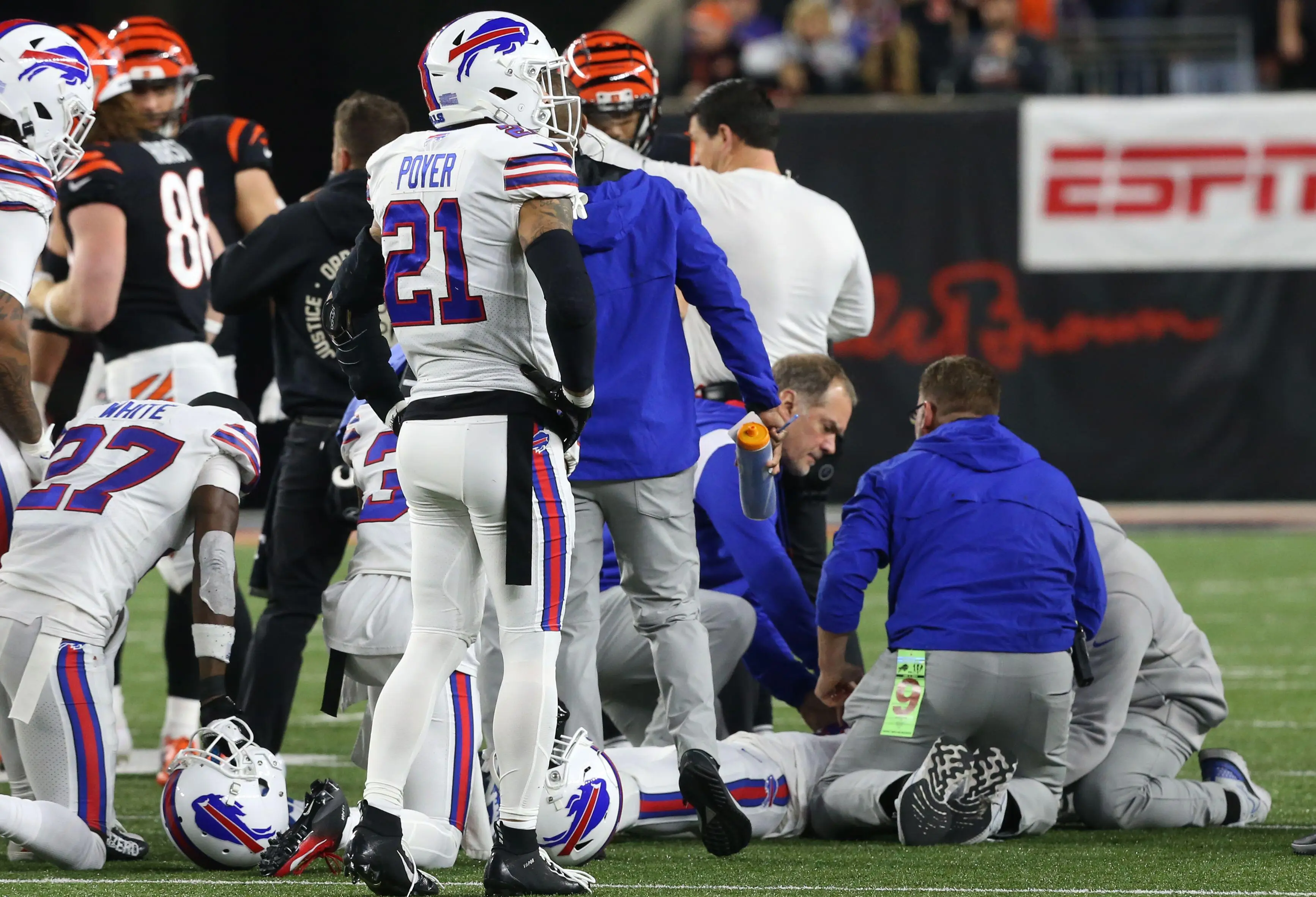 Buffalo Bills medical staff attend to Damar Hamlin.