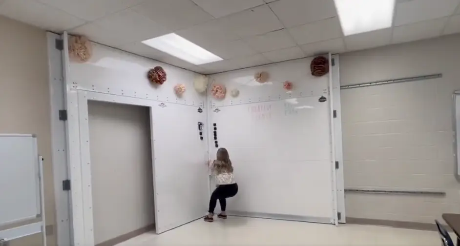 The room extends from a whiteboard.