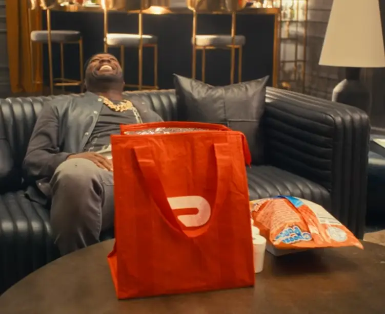 50 Cent took aim during a DoorDash commercial (YouTube/Doordash and 50 Cent)