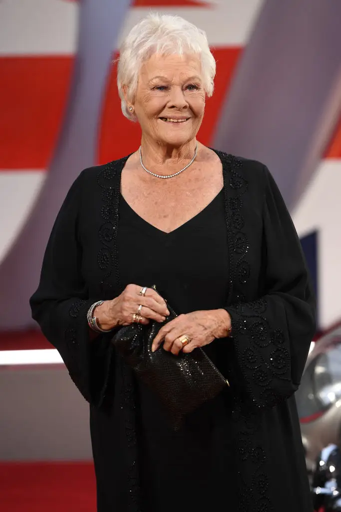 Dame Judi Dench is 91 and says she would like to die in a theater dressing room after a performance. (Photo by Ian Gavan/Getty Images for EON Productions, Metro-Goldwyn-Mayer Studios, and Universal Pictures)
