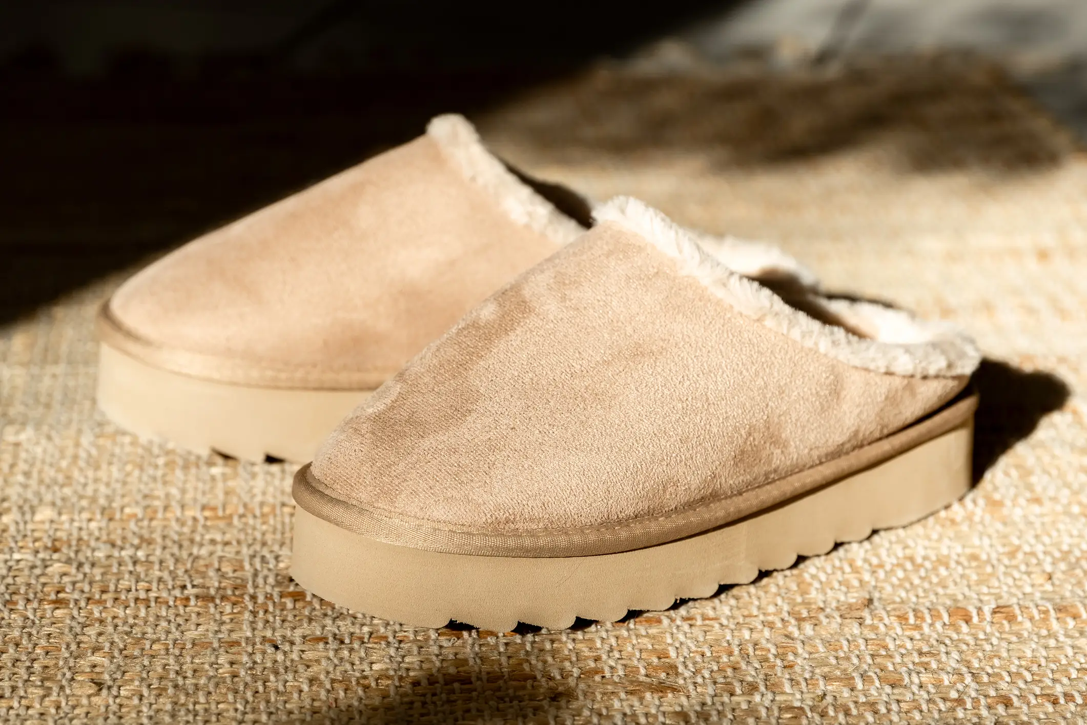 Despite admitting to owning a couple of pairs, Christopher Nolan has banned Uggs from his sets as it brings the actors 'out of the reality' of the film(Getty stock image)