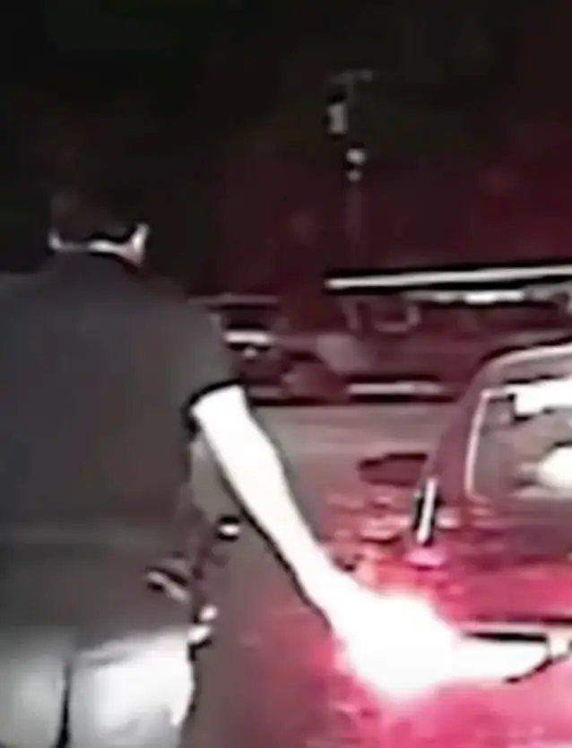 The patting of the rear of the vehicle subsequently acts as a safety precaution for the officer should something happen to them.