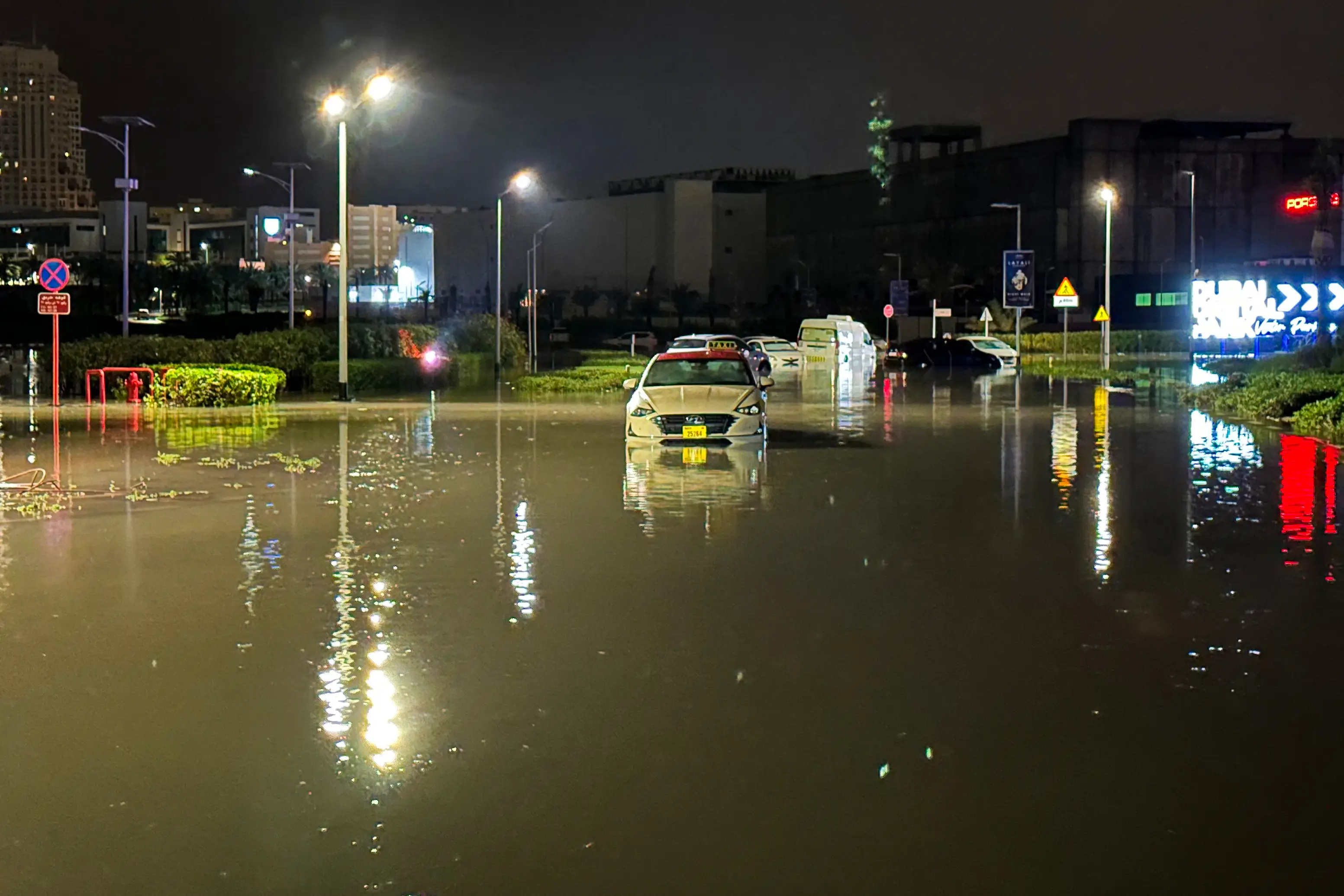 Vehicles have been left stranded in the streets (GIUSEPPE CACACE/AFP via Getty Images)