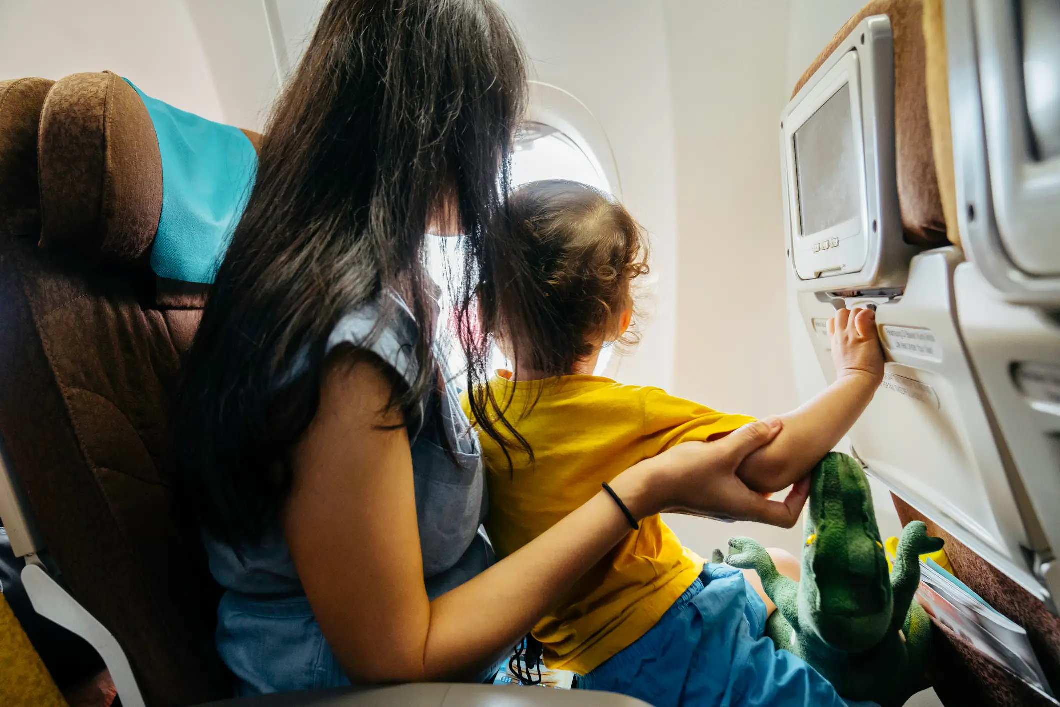 The mom was struggling having her son on her lap for the flight (Getty Stock)