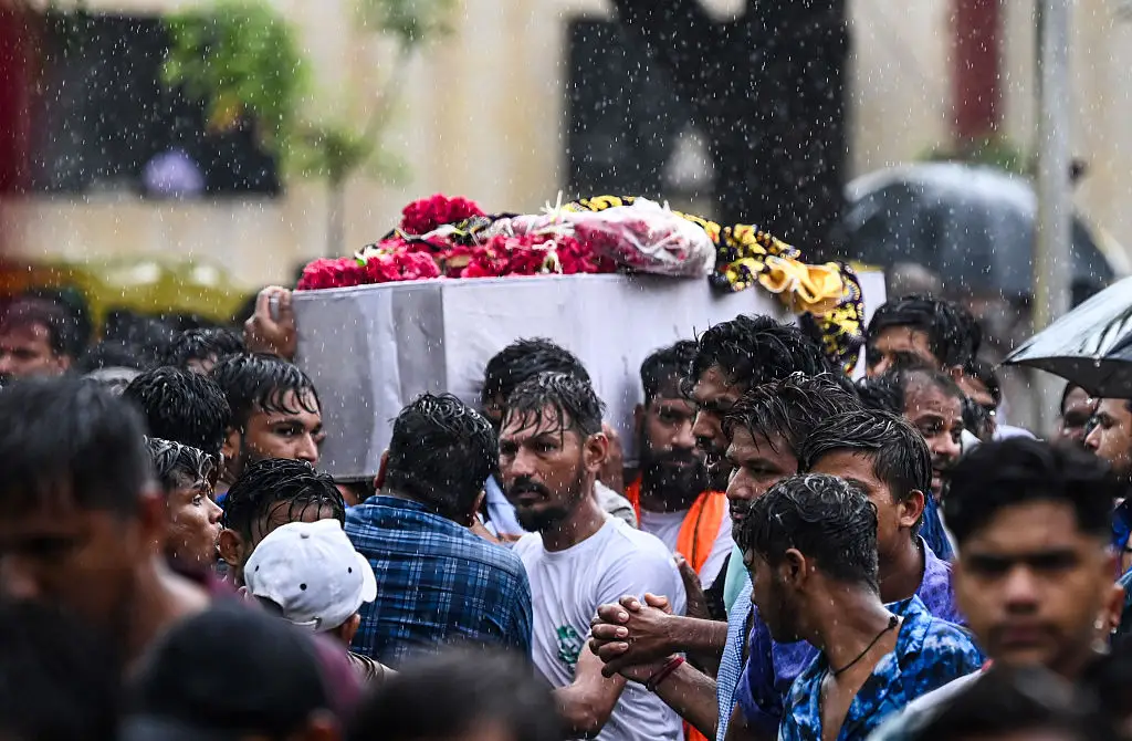 The funeral for 15-year-old victim Akash Patni, who was killed on the ground near his family's tea stall, was held in Ahmedabad (Raju Shinde/Hindustan Times via Getty Images)