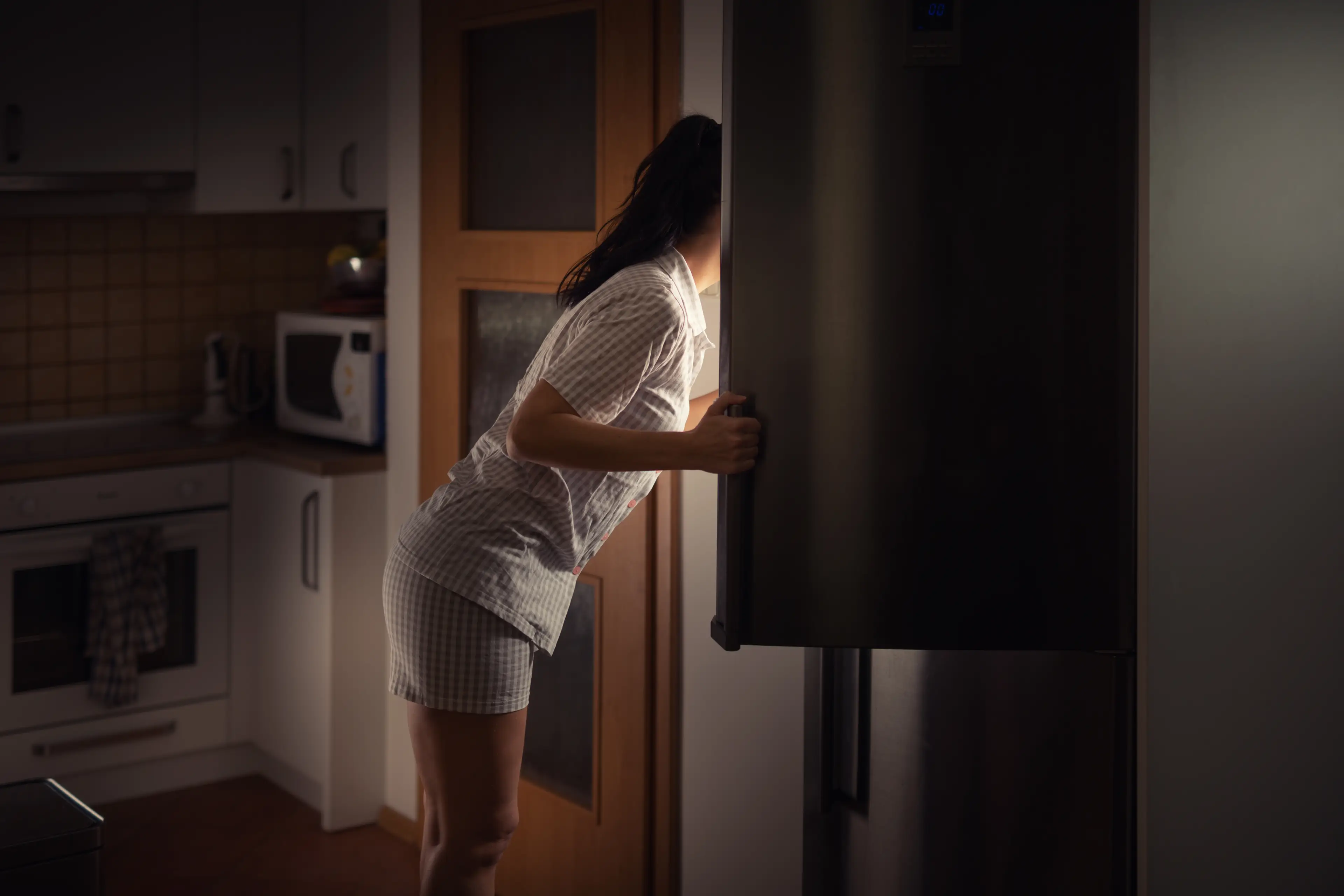 Raiding the fridge will only make it harder to get to sleep (Getty Stock Images)