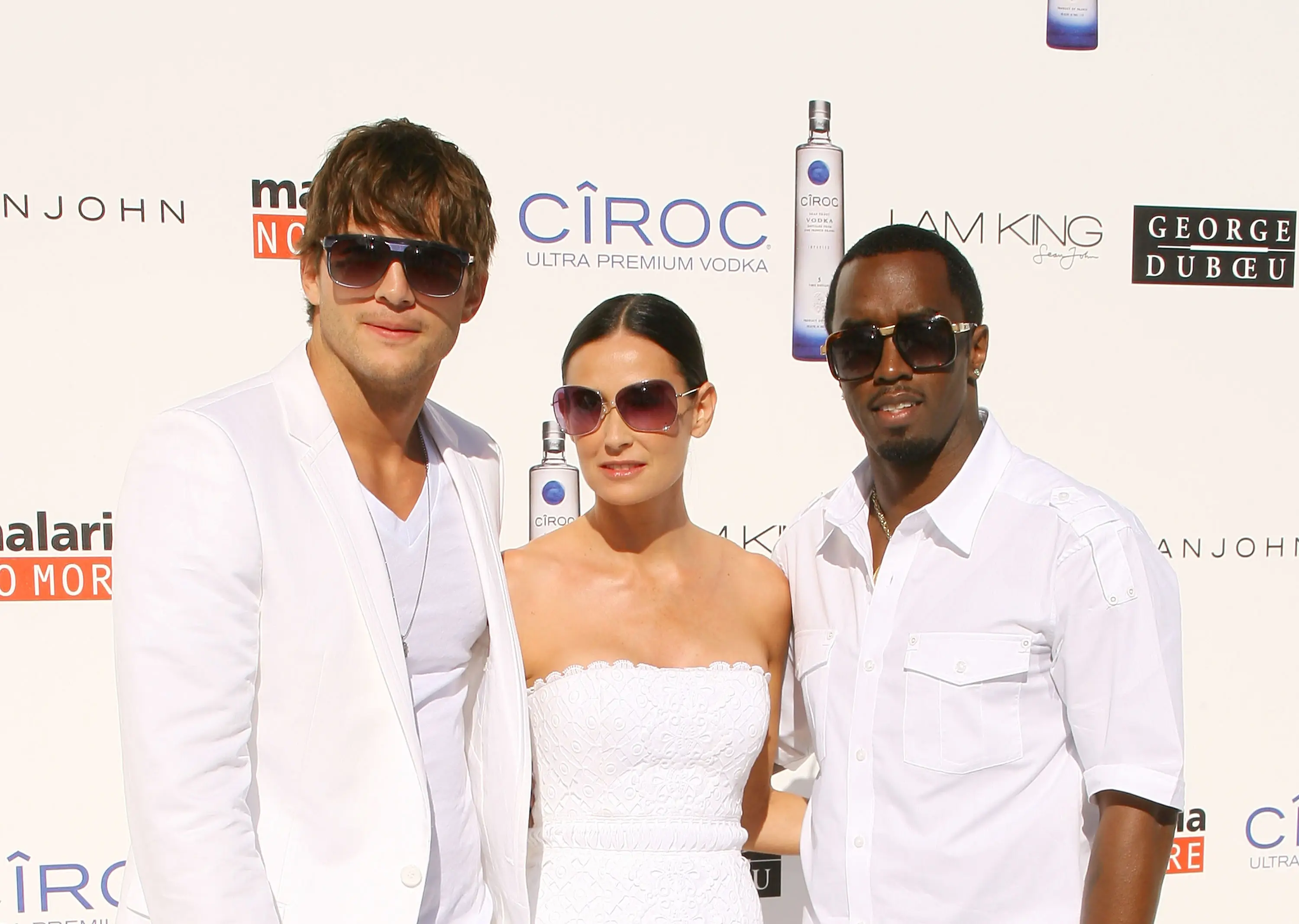 Ashton Kutcher, Demi Moore and P Diddy seen in 2009 (Michael Tran/FilmMagic)